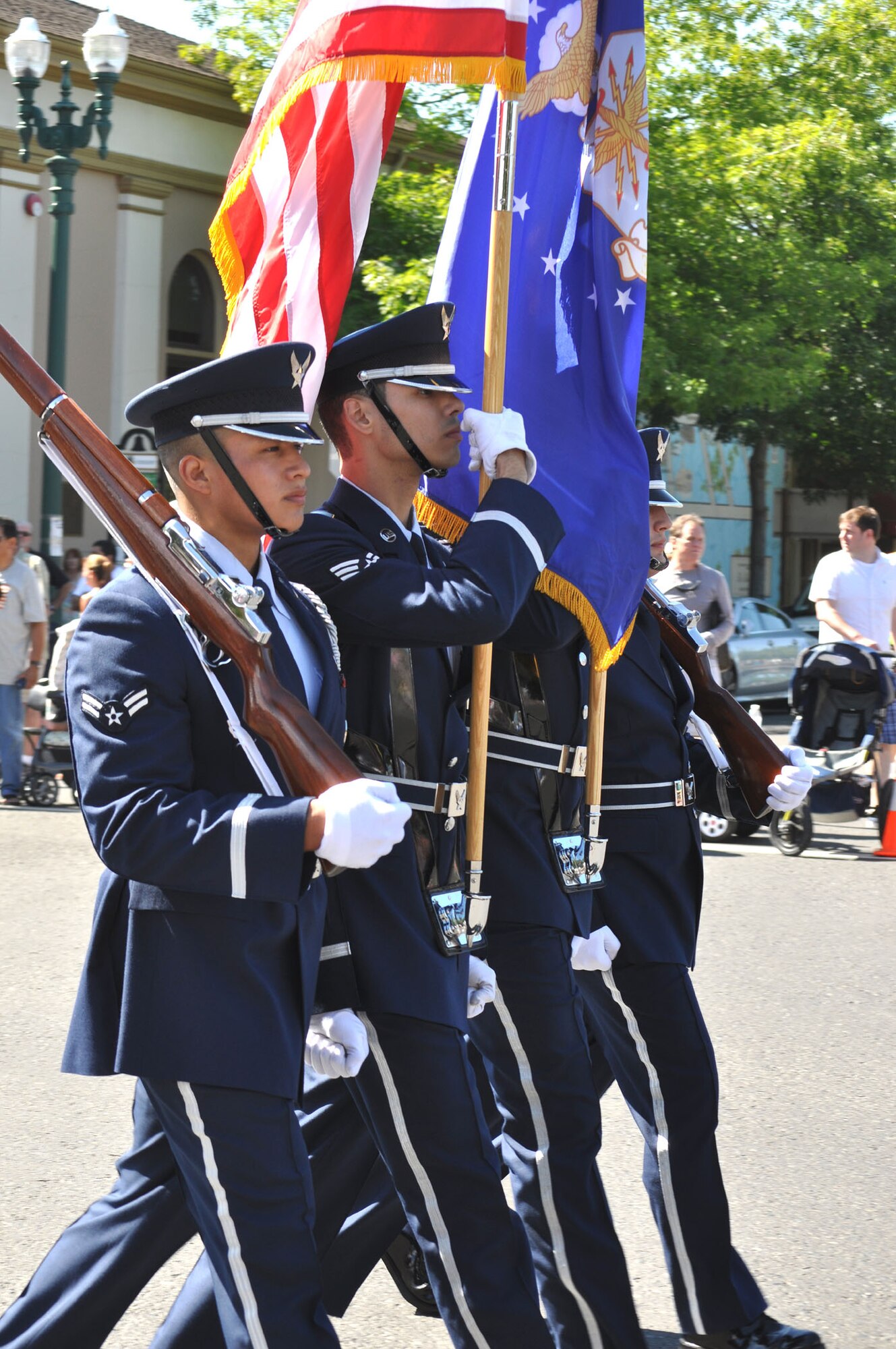 TRAVIS AIR FORCE BASE, Calif. --Stepping off to lead the Sonoma, Calif., Fourth of July parade was the Travis Air Force Base Honor Guard. Airmen from th 60th and 349th Air Mobility Wings and the 615th Contingency Response Wing, were out in the Solano County communities and Sonoma to help our local community partners celebrate the 235th birthday of America in over-the-top fashion. (U.S. Air Force photo/Senior Master Sgt. Ellen L. Hatfield)