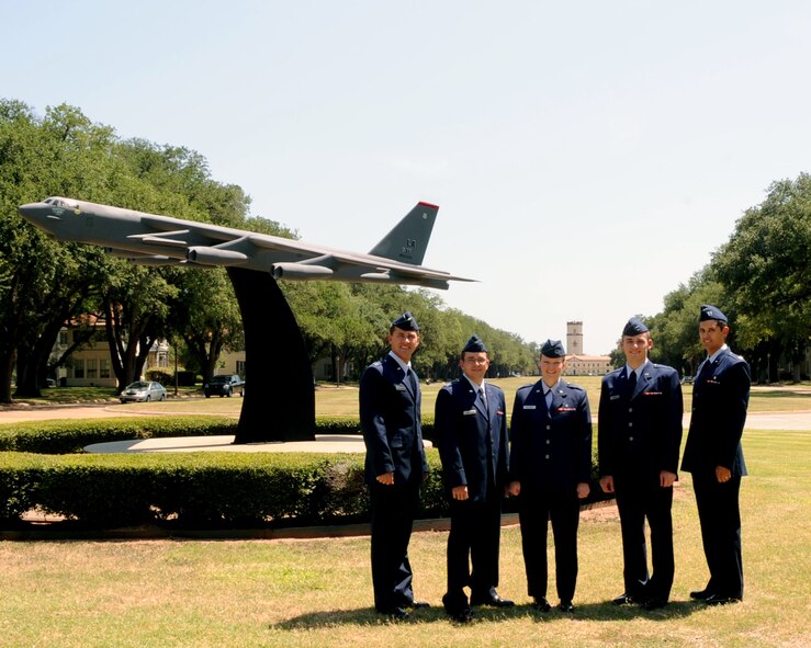 Capt. Render Parkman, Capt. Cody Giesler, Capt. Lindsey Merchant, Capt. Nicholas Berns and Capt. Donald Pritchett pose for a photo on Barksdale Air Force Base, La., July 13. The captains are part of the 2nd Dental Squadron Advanced Education in General Dentistry Residency program.  The AEGD residency is a highly competitive one-year, post-doctorate training program for licensed active duty Air Force dentists. The dental residents graduate on July 25 at 10 a.m. at the Chapel 2 Annex. (U.S. Air Force photo/Senior Airman La'Shanette V. Garrett)(RELEASED)