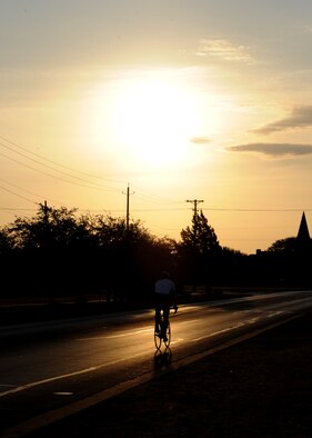 A competitor cools down after completing Le Tour De Dyess here July 16, 2011. More than 50 cyclists challenged themselves during the 26 mile course that started at the fitness center and weaved throughout the base. (U.S. Air Force photo by Airman 1st Class Jonathan Stefanko/Released)