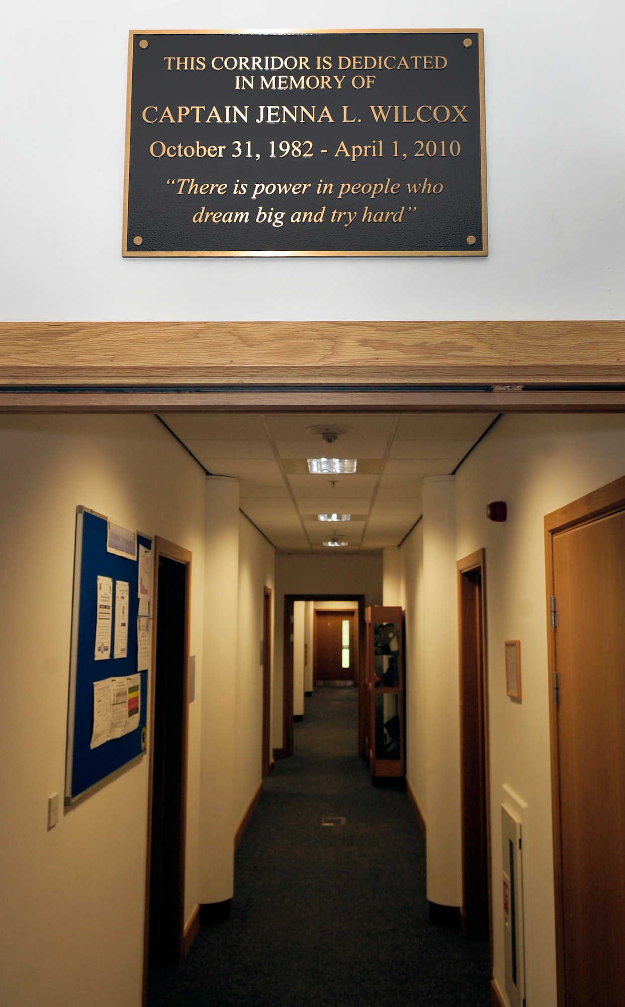 RAF MILDENHALL, England – The 100th Civil Engineer Squadron dedicated a corridor in their headquarters building to Capt. Jenna Wilcox July 14, 2011. Wilcox, a former 100th officer, died April 1, 2010. (U.S. Air Force photo / Senior Airman Ethan Morgan)