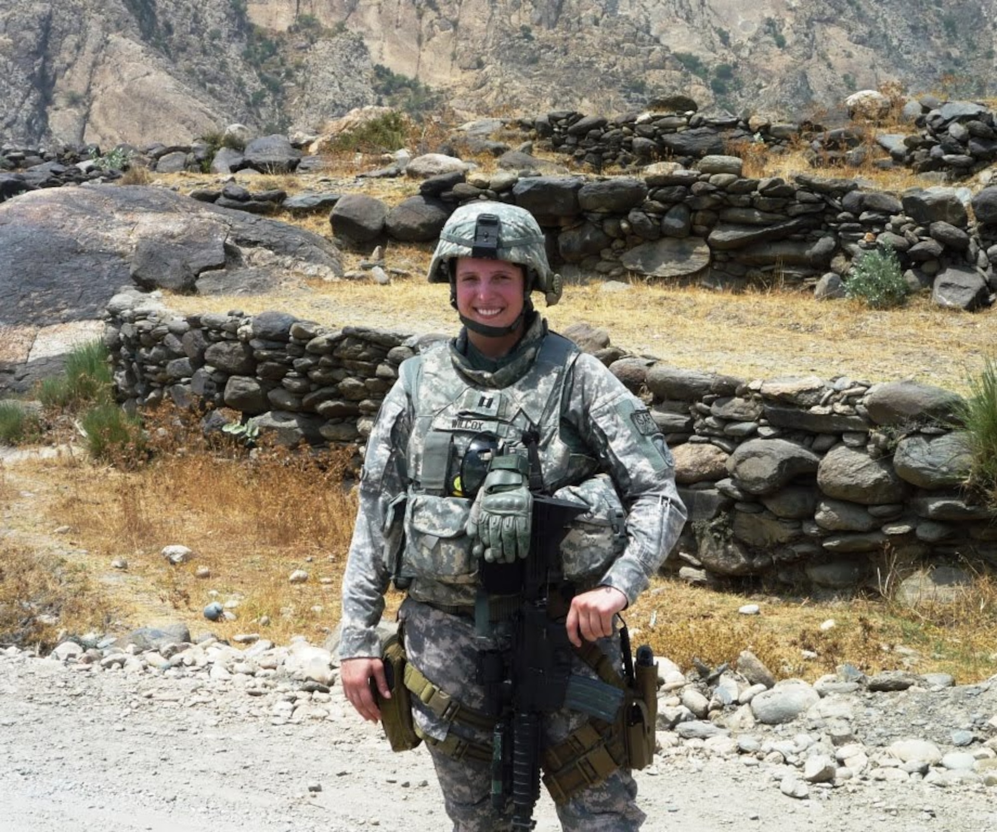 RAF MILDENHALL, England - Capt. Jenna Wilcox, 100th Civil Engineer Squadron, poses during her nine-month deployment to Afghanistan, which ended March 2010. Wilcox died April 1, 2010. Her name and memory will forever be memorialized in the Readiness and Emergency Management corridor of the 100th CES headquarters building – in the very halls and among the same team she led prior to her 27-year-old life being cut short. (Courtesy photo)