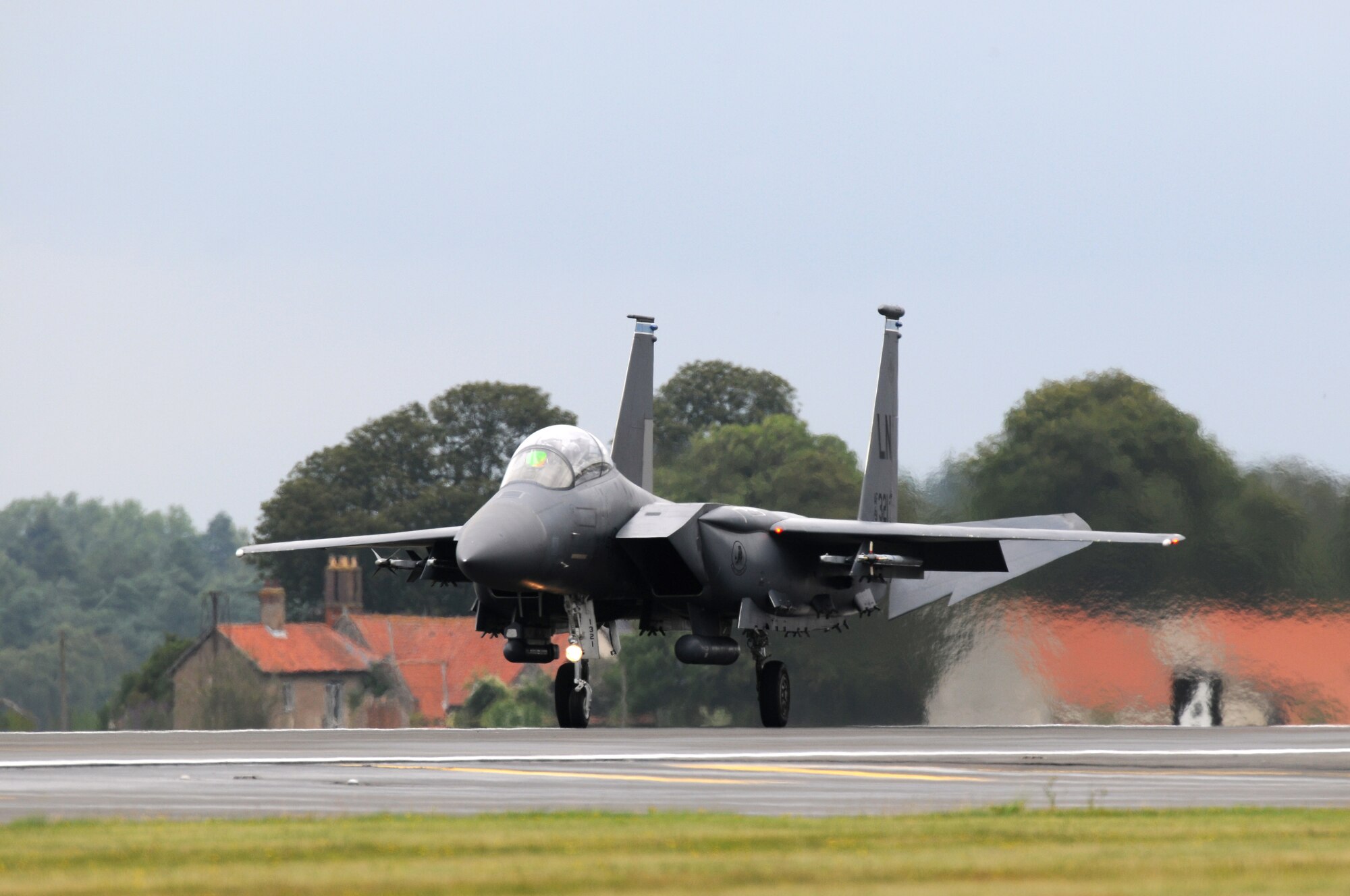 ROYAL AIR FORCE LAKENHEATH, England - An F-15E Strike Eagle taxis upon returning to RAF Lakenheath after the flightline construction was completed, July 18, 2011. The runway closure was part of a three year plan to renovate the entire flightline. The jets were stationed at RAF Mildenhall for 17 days during the last phase.  (U.S. Air Force photo/Airman Cory Payne)