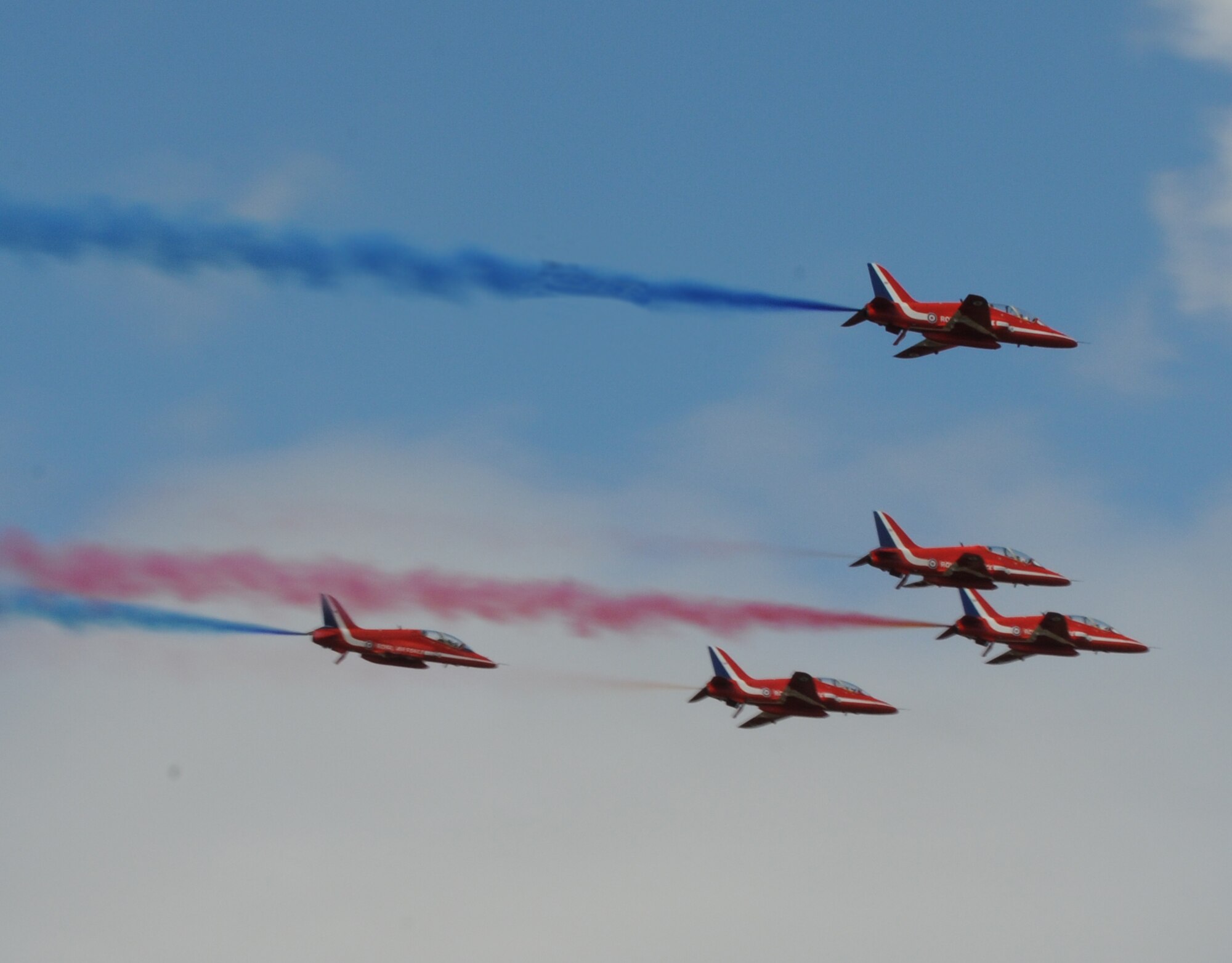 RAF FAIRFORD, United Kingdom - The Red Arrows perform at the Royal International Air Tattoo here July 16. The tattoo has been showcased at RAF Fairford more than 20 times since 1985. 