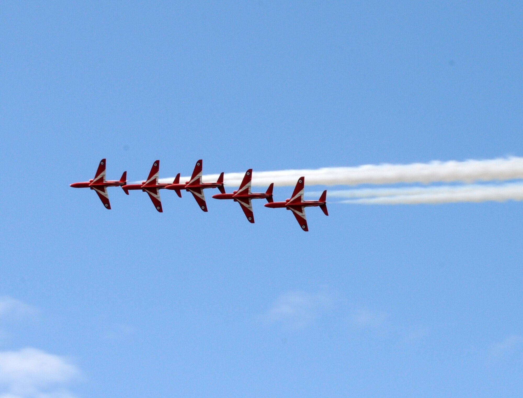 RAF FAIRFORD, United Kingdom - The Red Arrows perform at the Royal International Air Tattoo here July 16. The tattoo has been showcased at RAF Fairford more than 20 times since 1985. 