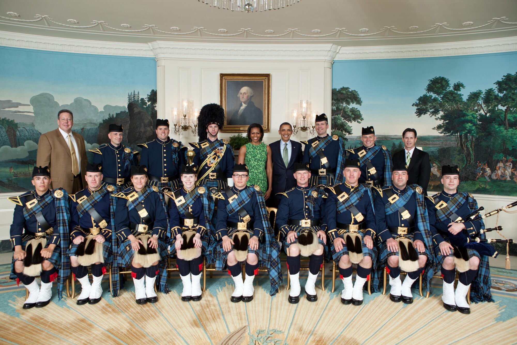 Master Sgt. Benny Hill, 412th MXLS B-2 crewchief and bagpiper, stands next to President Barack Obama in the Diplomatic Reception Room of the White House with the Band of the United States Air Force Reserve Pipe Band during a St. Patrick’s Day reception, March 17. (Official White House photo by Chuck Kennedy)