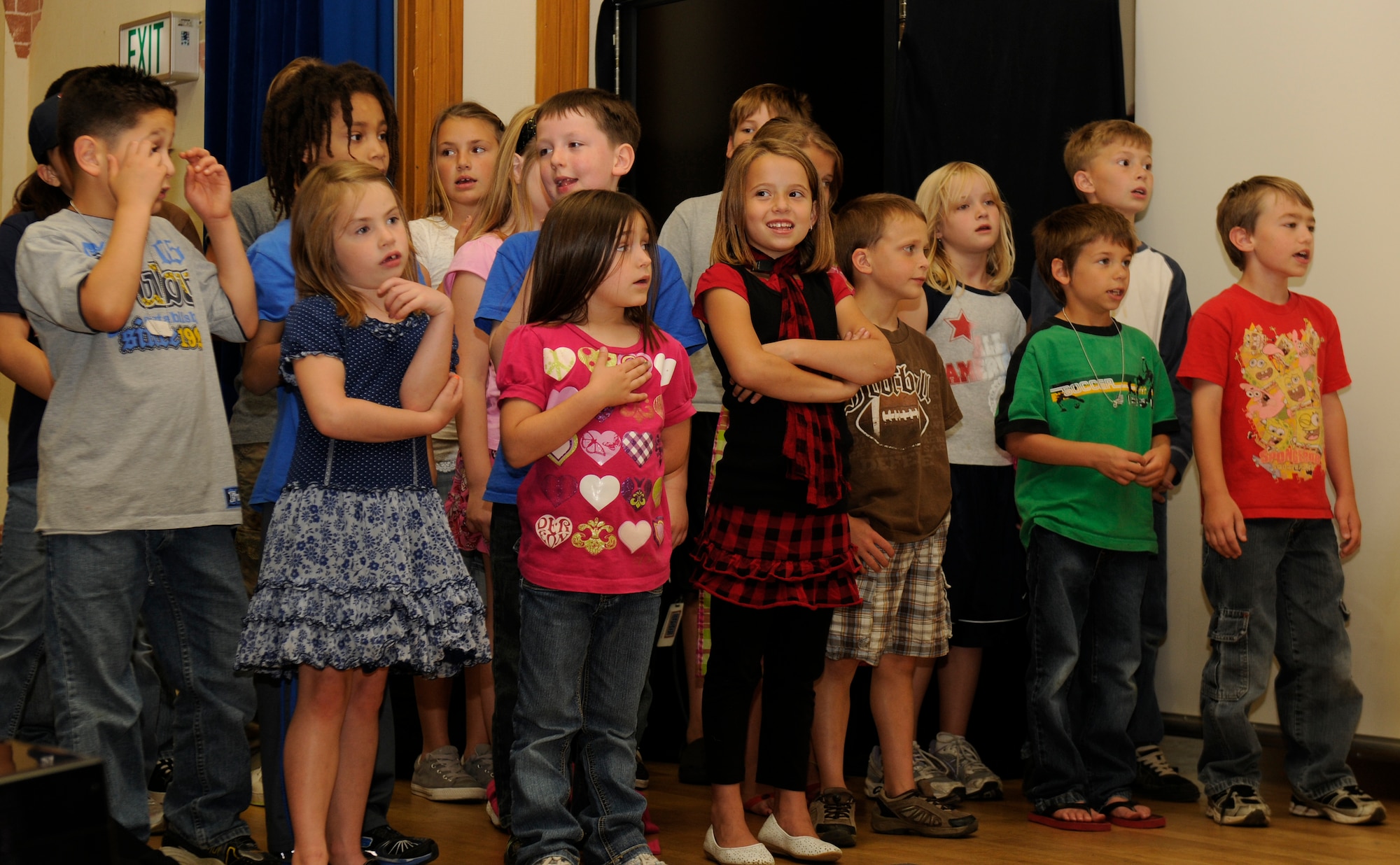 SPANGDAHLEM AIR BASE, Germany -- Children sing to their parents during the With You All the Way Deployment Support Camp sponsored by the 52nd Force Support Squadron Youth Programs here July 15. The camp was held to help children navigate the many unique situations faced before, during and after a parent’s deployment. (U.S. Air Force photo/Airman 1st Class Brittney Frees) 