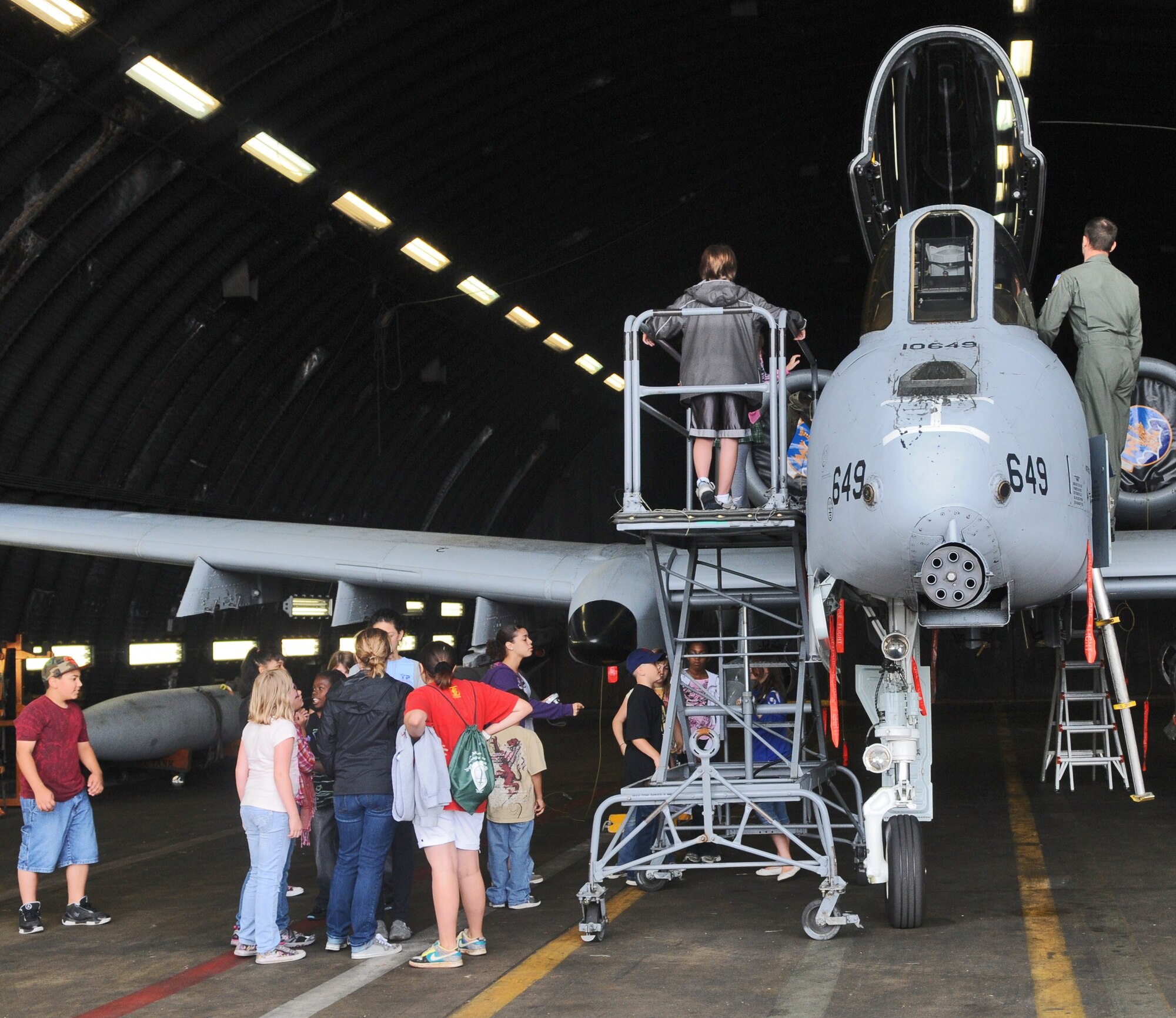SPANGDAHLEM AIR BASE, Germany – Participants of the Youth and Teen Center’s Aerospace Training Camp are given a tour of an A-10 Thunderbolt during a visit to the 81st Fighter Squadron here July 13. During the visit, children were also briefed on possible careers in aerospace. (U.S. Air Force photo/Senior Airman Nick Wilson)