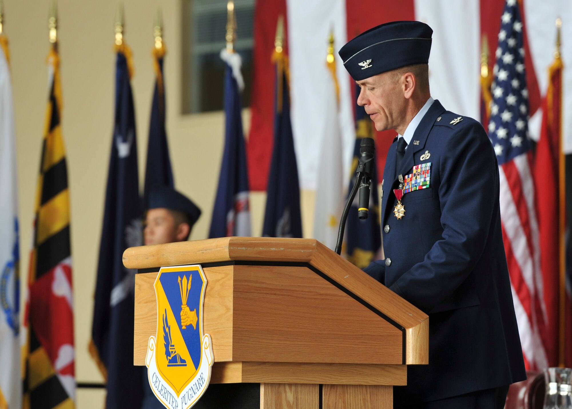 YOKOTA AIR BASE, Japan -- Col. Christopher Mardis, 374th Maintenance Group outgoing commander, gives his farewell speech during the 374th MXG change of command ceremony at Yokota Air Base, Japan, July 18, 2011. (U.S. Air Force photo/Senior Airman Andrea Salazar)