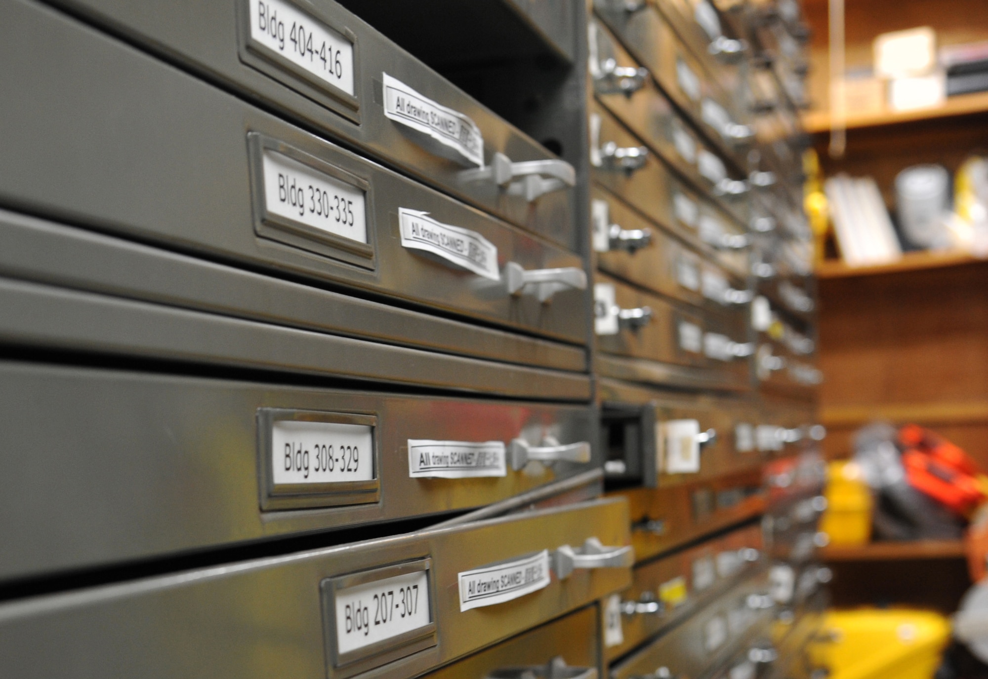 YOKOTA AIR BASE, Japan -- File drawers containing base facility blueprints are secured inside a vault at Yokota Air Base, Japan, June 29, 2011. Currently, base facility information is being put in digital format in order to be accessed quicker and easier. (U.S. Air Force photo/Senior Airman Andrea Salazar)