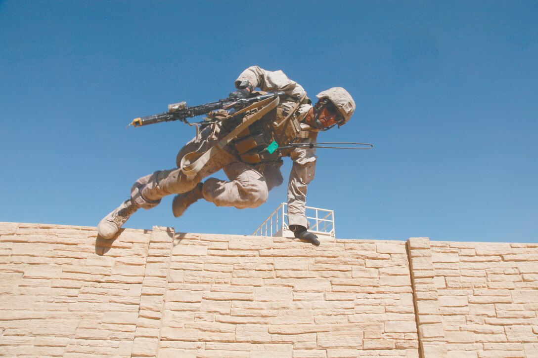 U.S. Marines with Company L, 3rd Battalion, 7th Marine Regiment, participate in a Key Leader Engagement lane during Enhanced Mohave Viper Range 220, Marine Corps Air Ground Combat Center Twentynine Palms, Calif. July 19, 2011. The training was in preparation for an upcoming deployment to Afghanistan.