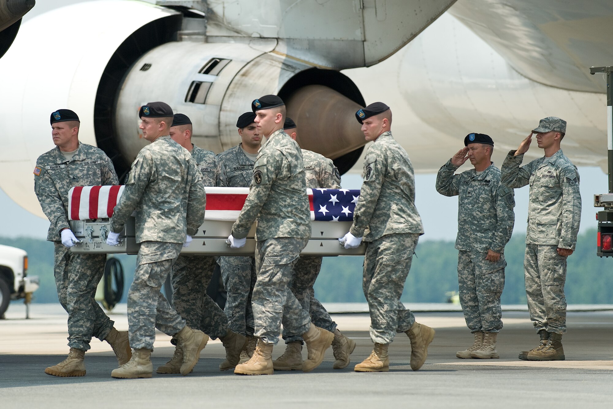 A U.S. Army carry team transfers the remains of Army Sgt. Edward W. Koehler, of Williamstown, Pa., at Dover Air Force Base, Del., July 20, 2011. (U.S. Air Force photo/Roland Balik)