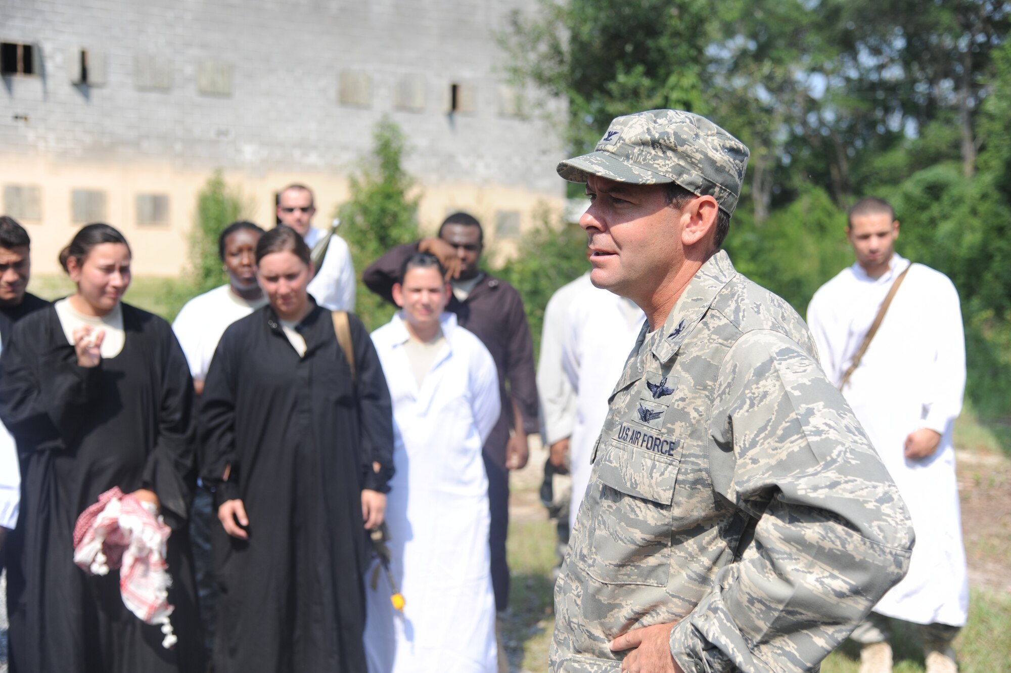 U.S. Air Force Col. Scott Kindsvater, 93rd Air Ground Operations Wing commander, gives a closing speech to participants of an urban terrain demo at Moody Air Force Base, Ga., July 20, 2011. Kindsvater recently took over command of the wing and spent part of the day viewing the capabilities of his Airmen and becoming familiar with what they do. (U.S. Air Force photo by Airman 1st Class Paul Francis/Released)
