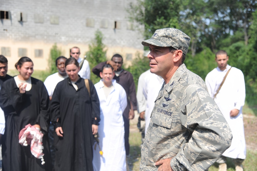 U.S. Air Force Col. Scott Kindsvater, 93rd Air Ground Operations Wing commander, gives a closing speech to participants of an urban terrain demo at Moody Air Force Base, Ga., July 20, 2011. Kindsvater recently took over command of the wing and spent part of the day viewing the capabilities of his Airmen and becoming familiar with what they do. (U.S. Air Force photo by Airman 1st Class Paul Francis/Released)
