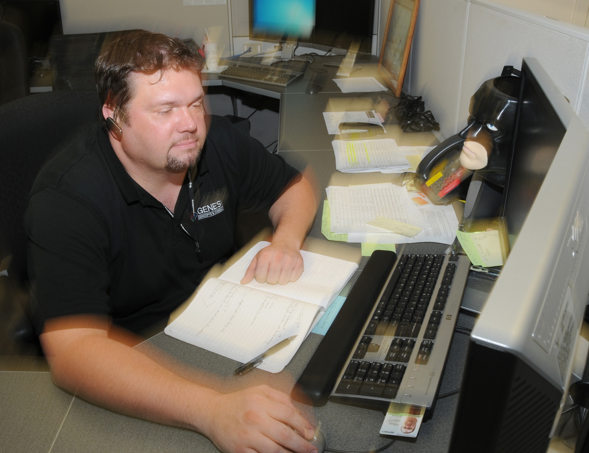Wayne Braswell, 81st Communications Squadron contractor, works on the Windows 7 migration July 5 at the 81st CS building.  Mr. Braswell leads specific project.  (U.S. Air Force photo by Kemberly Groue)
