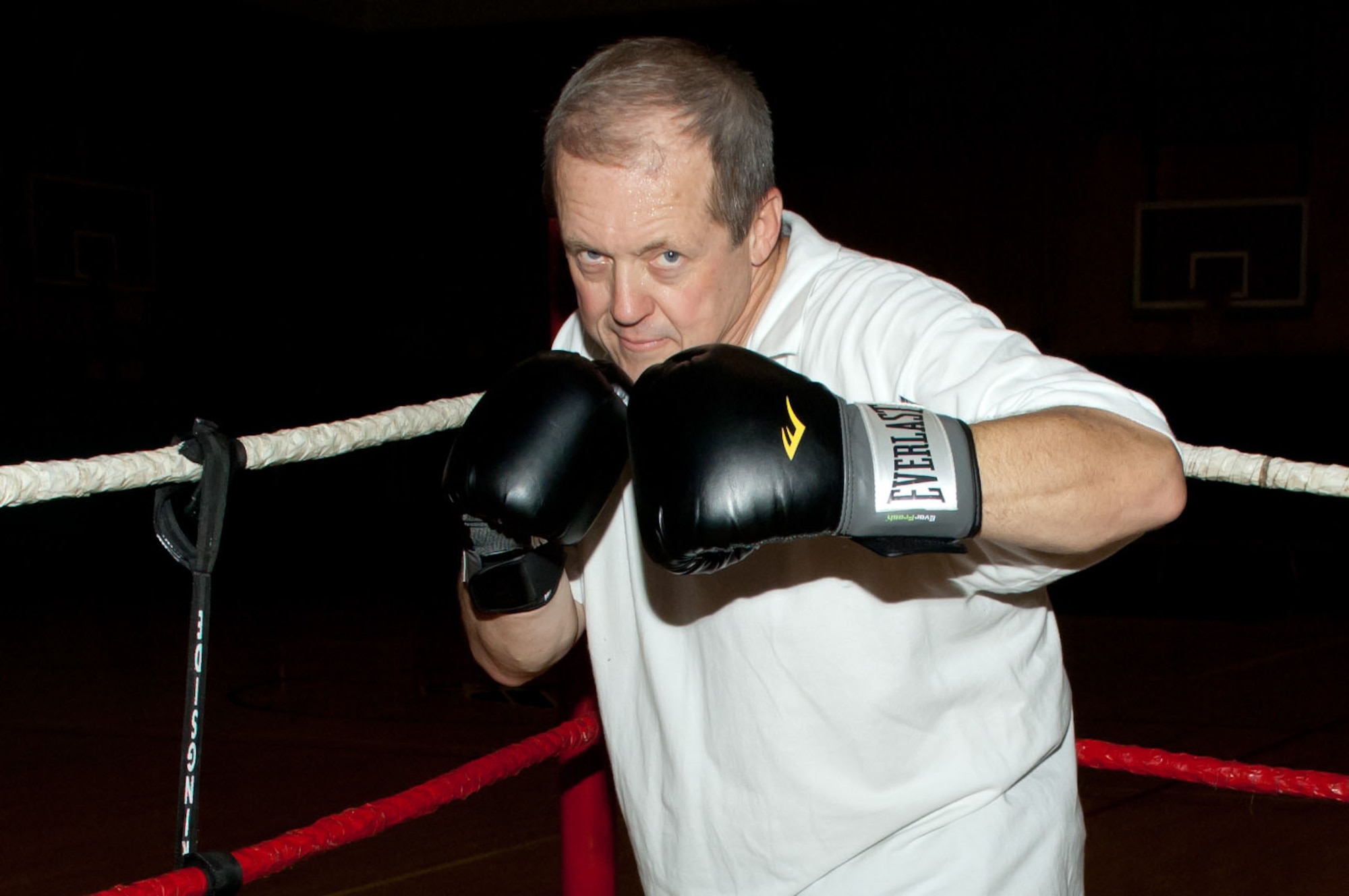 HANSCOM AIR FORCE BASE, Mass. - Gregory Leschishin stands in the boxing ring July 8. Mr. Leschishin, who has more than 35 years of boxing experience, offers boxing classes at the Fitness and Sports Center. (U.S. Air Force photo by Rick Berry)