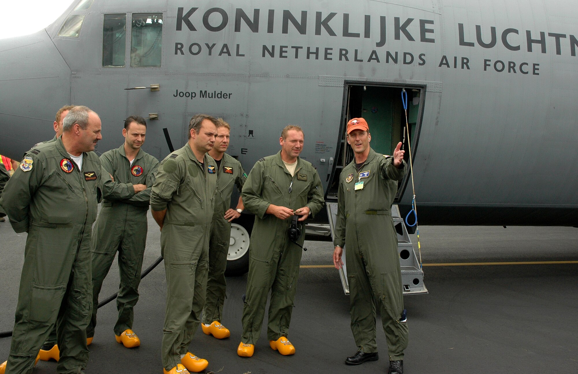 Lt.. Col. Colin Carr, 728th Airlift Squadron commander, McChord Field, Wash.,greets Dutch Majoor Rolph Diebels,Royal Netherlands Air Force, and his team after their arrival July 19 at McChord Field for Air Mobility Rodeo. Rodeo will be at McChord Field July 24-29, although international teams started arriving July 18.  Reservists from the 728th AS, are hosting the team from the Netherlands during Rodeo. (U.S. Air Force photo by Sandra Pishner)