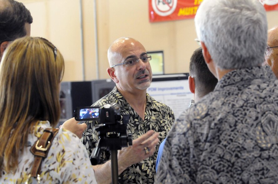 John B. Johns,  Deputy Assistant Secretary of Defense for Maintenance Policy and Programs (DoD), Washington, DC, speaks with media representatives during a tour of Robins facilities. Johns was at Robins attending the Peer-to-Peer conference this week. U. S. Air Force photo by Sue Sapp 