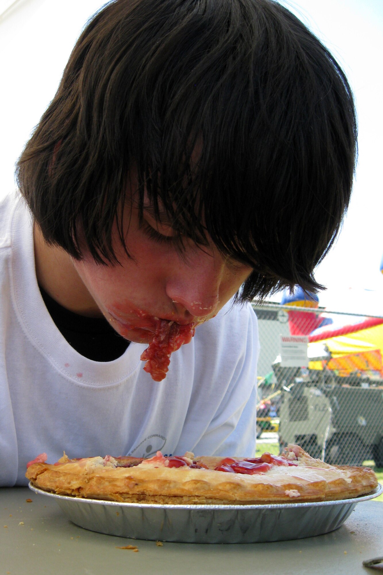 GRISSOM AIR RESERVE BASE, Ind. --  The winner of the pie eating contest gobbled up the competition during the Family Appreciation Day. Grissom's annual event was held during the July unit training assembly and offered games, contests and amusements for people of all ages. (U.S. Air Force photo/Tech. Sgt. Douglas Hays)