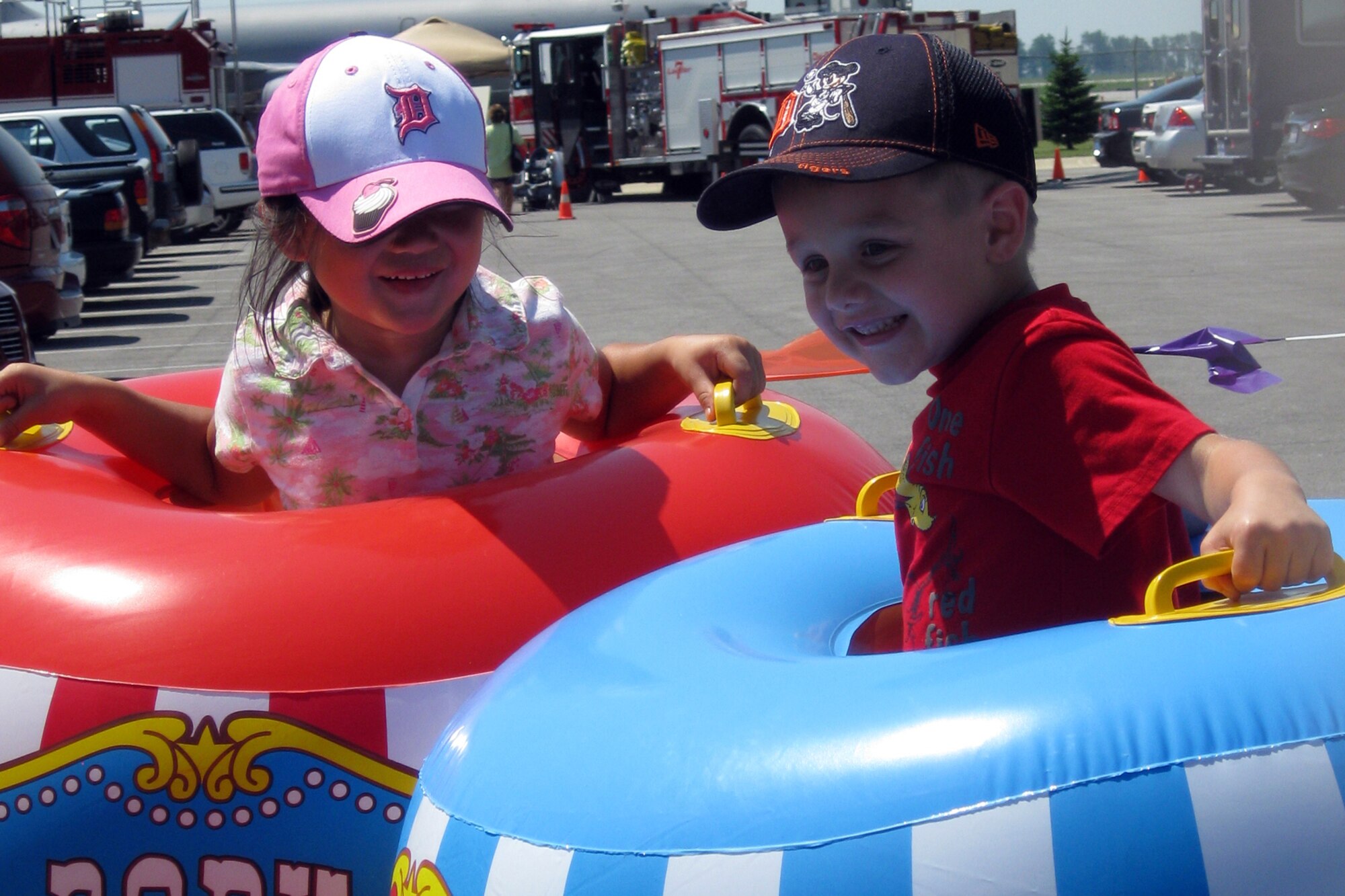 GRISSOM AIR RESERVE BASE, Ind. -- The children of Master Sgt. Rodney Honeycutt, 434th Maintenance Group career advisor, play in the kids zone area during the Family Appreciation Day. Grissom's annual event was held during the July unit training assembly. (U.S. Air Force photo/Tech. Sgt. Douglas Hays)