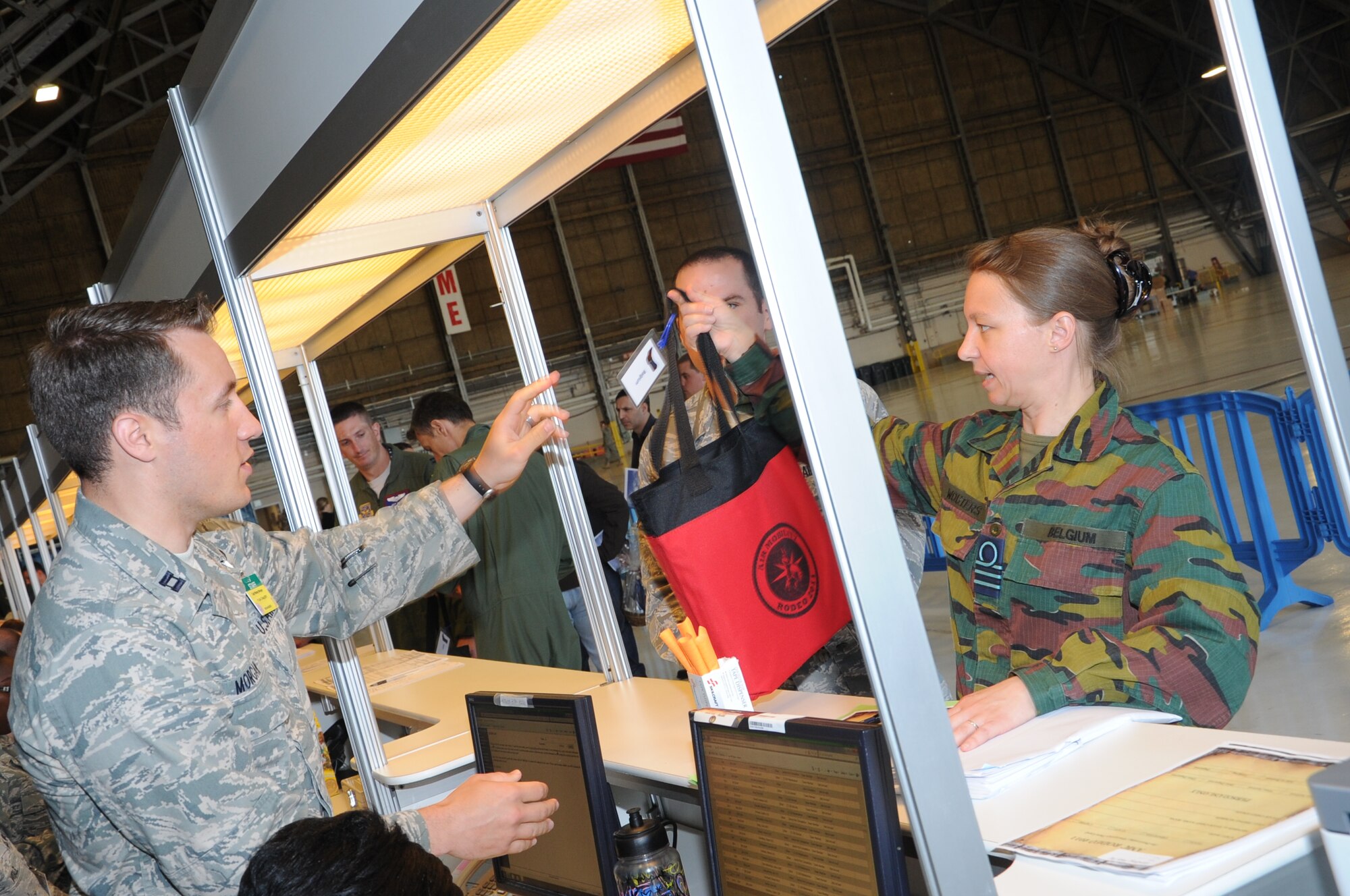 A Belgium airman processes through the processing line for Air Mobility Rodeo 2011 at Joint Base Lewis-McChord, Wash., on July 18, 2011. Rodeo is the U.S. Air Force's and Air Mobility Command's premier international combat skills and flying operations competition designed to develop and improve techniques, procedures, and interoperability, while optimizing international mobility  partnerships and enhancing mobility operations. (U.S. Air Force Photo/Tech. Sgt. Christine Jones)