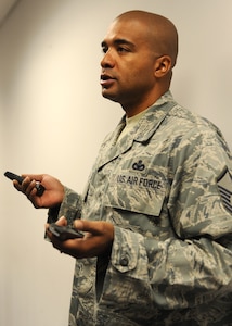 Master Sgt. Sabadilla Lloyd conducts small arms training for military members at Joint Base Charleston July 20. The weapons training is part of the base-wide circuit training being conducted to prepare personnel for the upcoming Operation Readiness Inspection. Lloyd is a training superintendent attached to the 628th Security Forces Squadron. (U.S. Air Force photo/Staff Sgt. Katie Gieratz) 