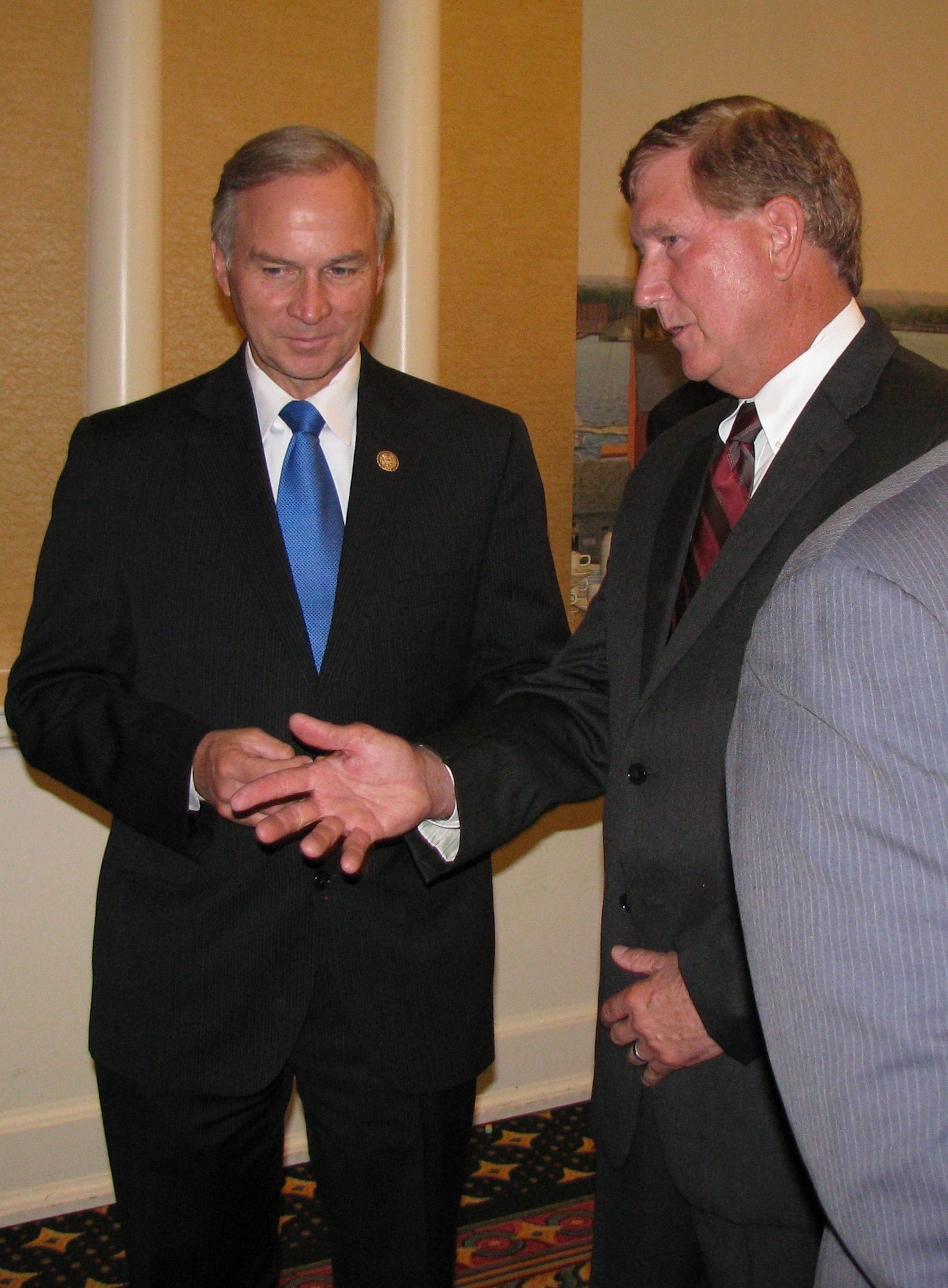 Terry Yonkers (right), the assistant secretary of Air Force for installations, environment and logistics, talks with Virginia Congressman Randy Forbes July 19, 2011, at the Association of Defense Communities annual conference in Norfolk, Va.  Air Force officials participate in this event, underscoring the commitment to local communities with active and closed military installations. (U.S. Air Force photo/Linda Geissinger)