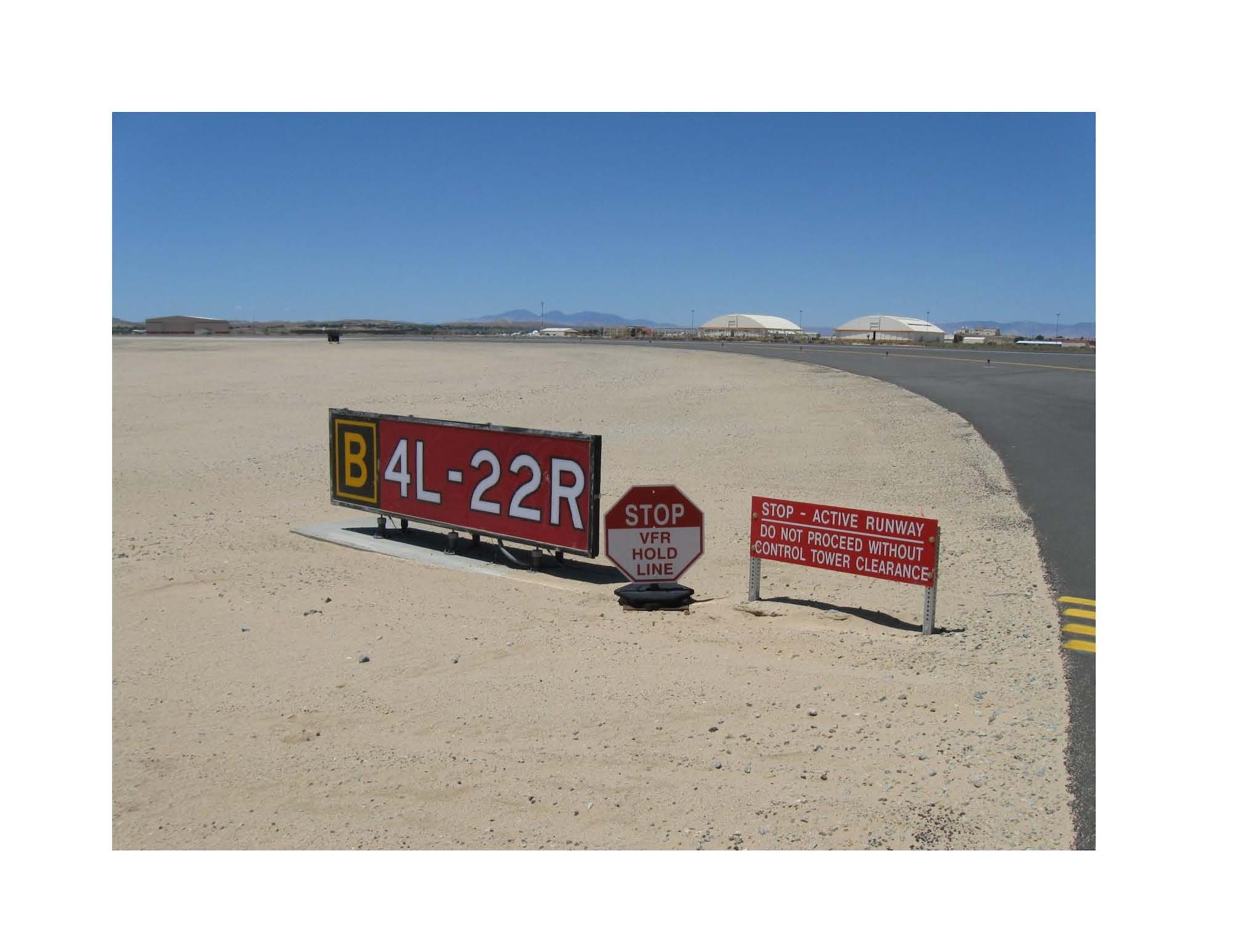 Runway Hold Position at Taxiway Bravo: These signs are located on all runways and require tower approval before proceeding any further. As a note, when the tower is closed, contact must be made with the Command Post or CONFORM, which monitors the Ramp Net. (Courtesy photo)