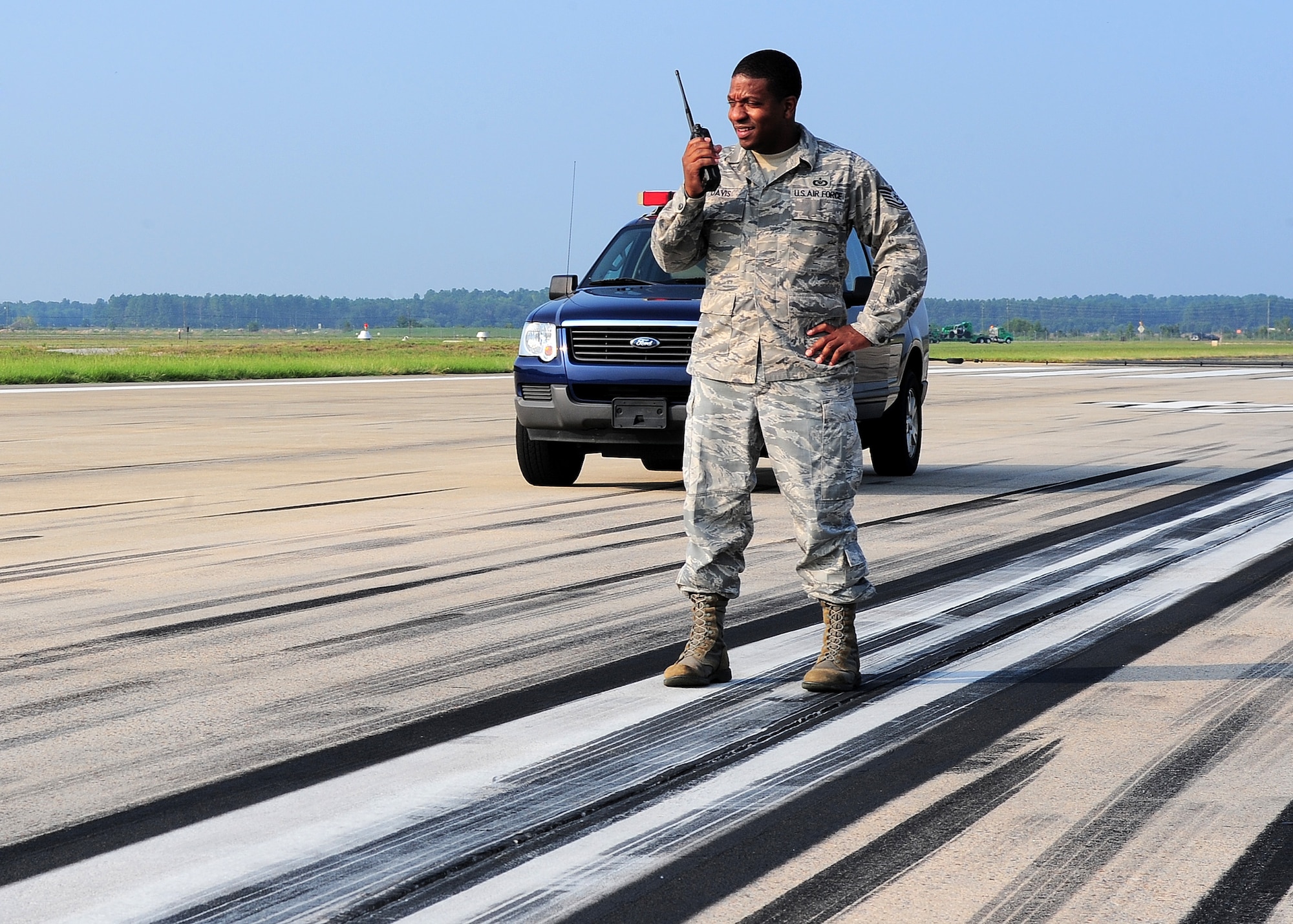 U.S. Air Force Tech. Sgt. Christopher Davis, 20th Operational Support Squadron deputy airfield manager, inspects the flight line, Shaw Air Force Base, S.C., July 20, 2011. Davis recently discovered a hole in the centerfield portion of the primary runaway and led the coordination to expediantly repair it so there was no effect on daily flight operations. He is the Warrior of the Week for the week of July 18 through 27. (U.S. Air Force photo/Airman 1st Class Daniel Phelps) (Released)