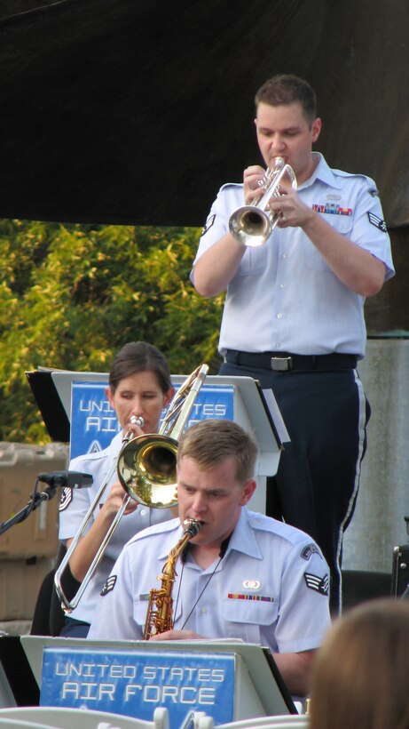 SrA Jason Smith, TSgt Lisa Drefke and SrA Ryan Leatherman perform with Dimensions in Blue in Fredericksburg, TX on July 8, 2011