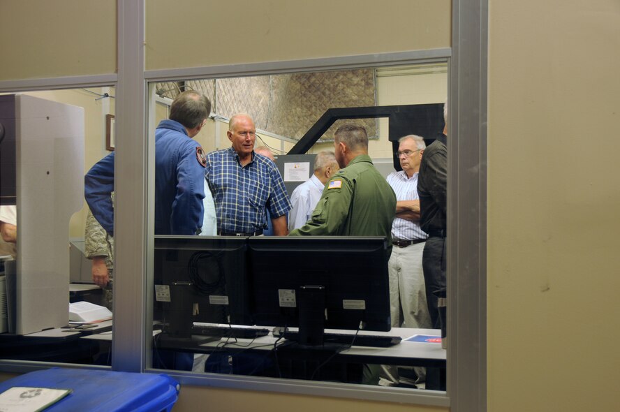 Retired LT. Col. Tom Cope, former commander of the 193rd Tactical Electronic Warfare Group, now the 193rd Special Operations Wing talks with Col. John Dickinson, commander of the 193rd Operations Group at Middletown PA during his visit on Tuesday, July 19, 2011. Cope was with a group of past wing and group commanders who were briefed on upgrades the unit has made to it aircraft, facilities and organization and included a tour of the wings Regional Support Group at Ft. Indiantown Gap, Annville PA.