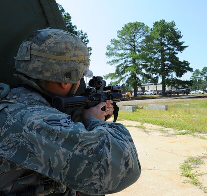 SEYMOUR JOHNSON AIR FORCE BASE, N.C. -- Airman 1st Class Joseph Kaczynski, 4th Security Forces Squadron patrolman, provides simulated base protection during a phase II operational readiness exercise here July 19, 2011. Kaczynski simulated the role of a quick reaction force member, which provides fire support to areas of the installation during an attack. (U.S. Air Force photo/Senior Airman Gino Reyes)(RELEASED)