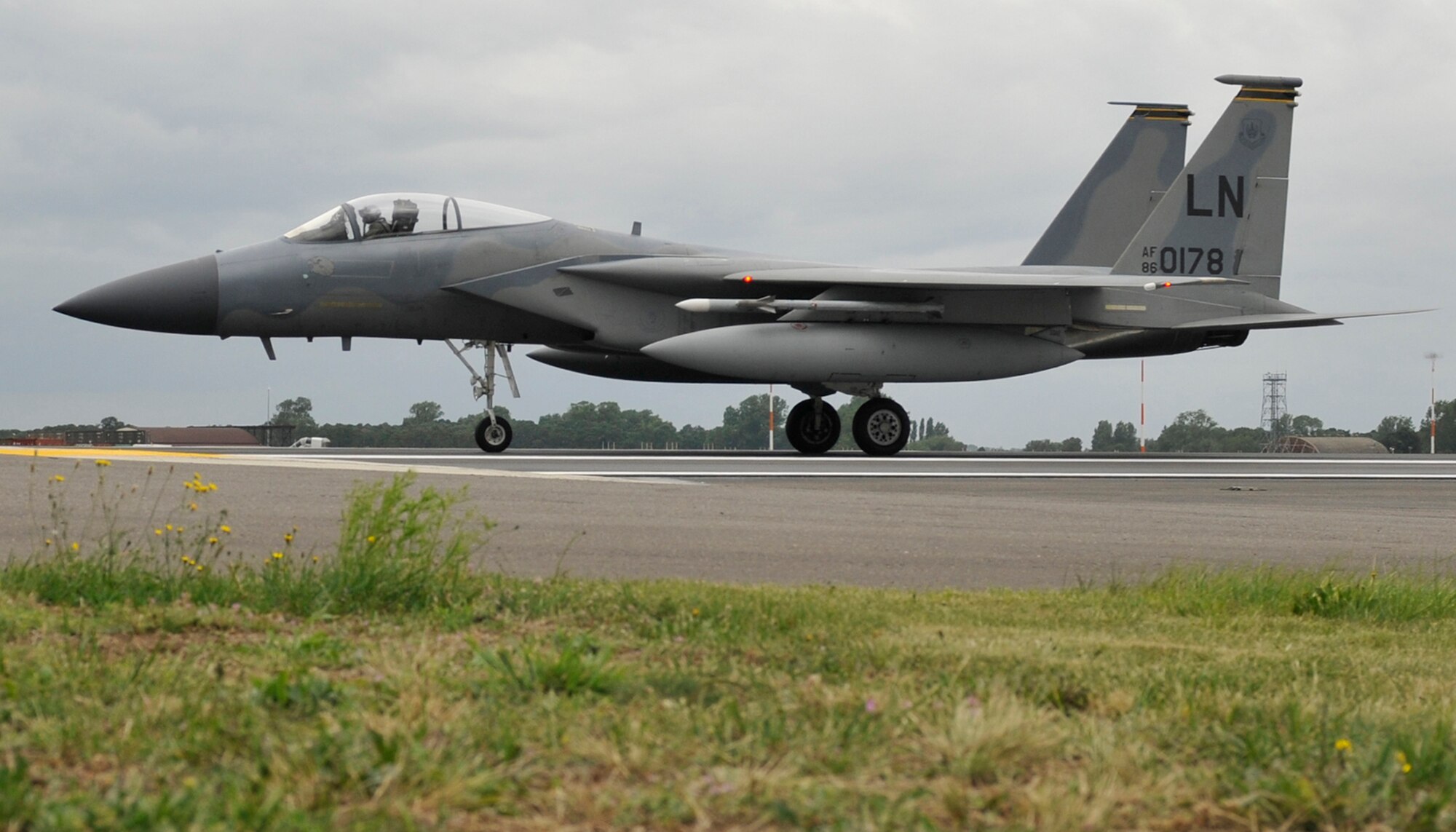 ROYAL AIR FORCE LAKENHEATH, England - An F-15C taxis upon returning to RAF Lakenheath after the flightline construction was completed, July 18, 2011. The runway closure was part of a three year plan to renovate the entire flightline. The jets were stationed at RAF Mildenhall for 17 days during the last phase.  (U.S. Air Force photo/Senior Airman Tiffany M. Deuel) 