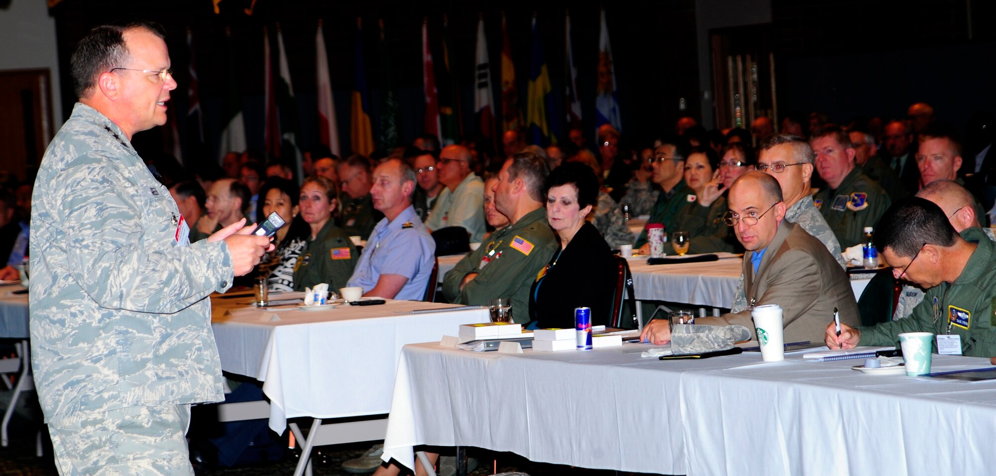 Lt. Gen. (Dr.) Charles Green, the Air Force surgeon general, address hundreds of medical professionals at the first-ever, U.S.-led international in-flight medical care conference July 21, 2011, at Joint Base Lewis-McChord. Green was the keynote speaker at day two of the International Aeromedical Evacuation/En Route Care Conference. The event brings together doctors, nurses and paramedics from around the globe to share stories, advice and lessons learned. (U.S. Air Force photo/Staff Sgt. J.G. Buzanowski)