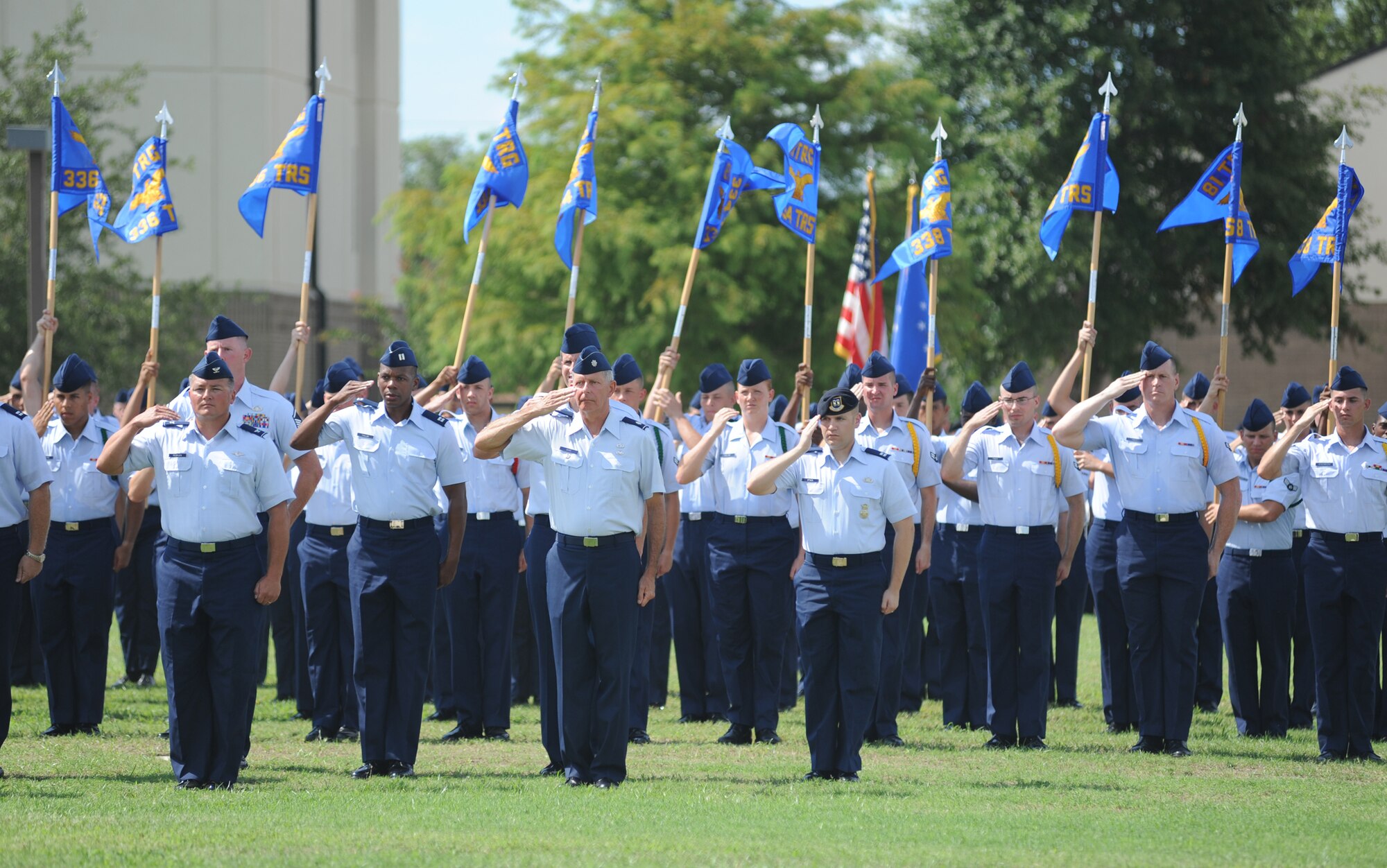 Parade group officers come to the center of the parade field to salute the commander of troops at the 2nd Air Force change of command ceremony July 21 at Keesler Air Force Base, Miss.   Brig. Gen. Leonard Patrick assumed command at the ceremony from Maj. Gen. Mary Kay Hertog.  Patrick previously commanded the 502nd Air Base Wing at Fort Sam Houston, Texas.  Hertog is headed to the Pentagon to direct the Department of Defense Sexual Assault Prevention and Response Office.  (U.S. Air Force photo by Kemberly Groue)
