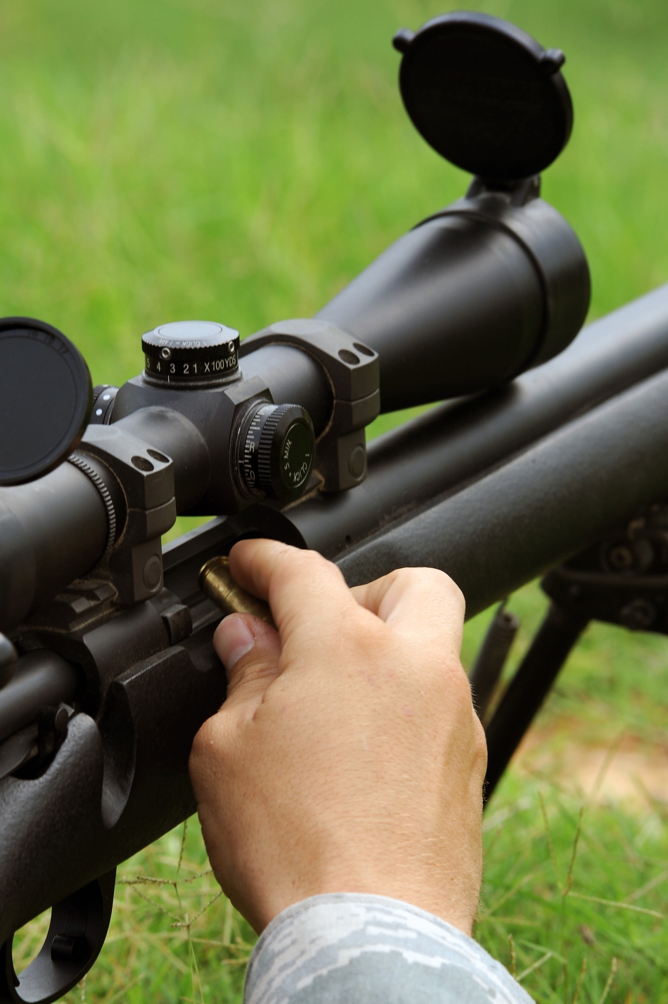 Senior Airman Timothy Collar, a 19th Security Forces Squadron trainer, unloads a round from an M-24 rifle July 7, 2011, at Camp Robinson, Ark., during advanced designated marksman training in preparation for the Air Mobility Command RODEO. ADM is one of three different events that SFS members participate in this year’s competition. (U.S. Air Force photo by Airman 1st Class Rusty Frank) 