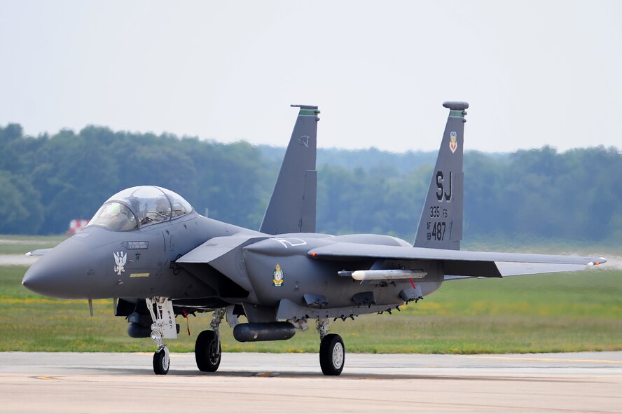 SEYMOUR JOHNSON AIR FORCE BASE, N.C. - Lt. Col. David Moeller and Capt. Joseph Stenger taxi to the end of the runway here July 19, 2011 for the maiden flight of the 335th Fighter Squadron's F-15E Strike Eagle flagship, which displays heritage patches for the squadrons' 70th anniversary. Moeller, 335th FS commander, hails from Moreno Valley, Calif., and Stenger, 335th FS pilot, is a native of Barnsville, Ohio. (U.S. Air Force photo by Senior Airman Rae Perry/RELEASED)