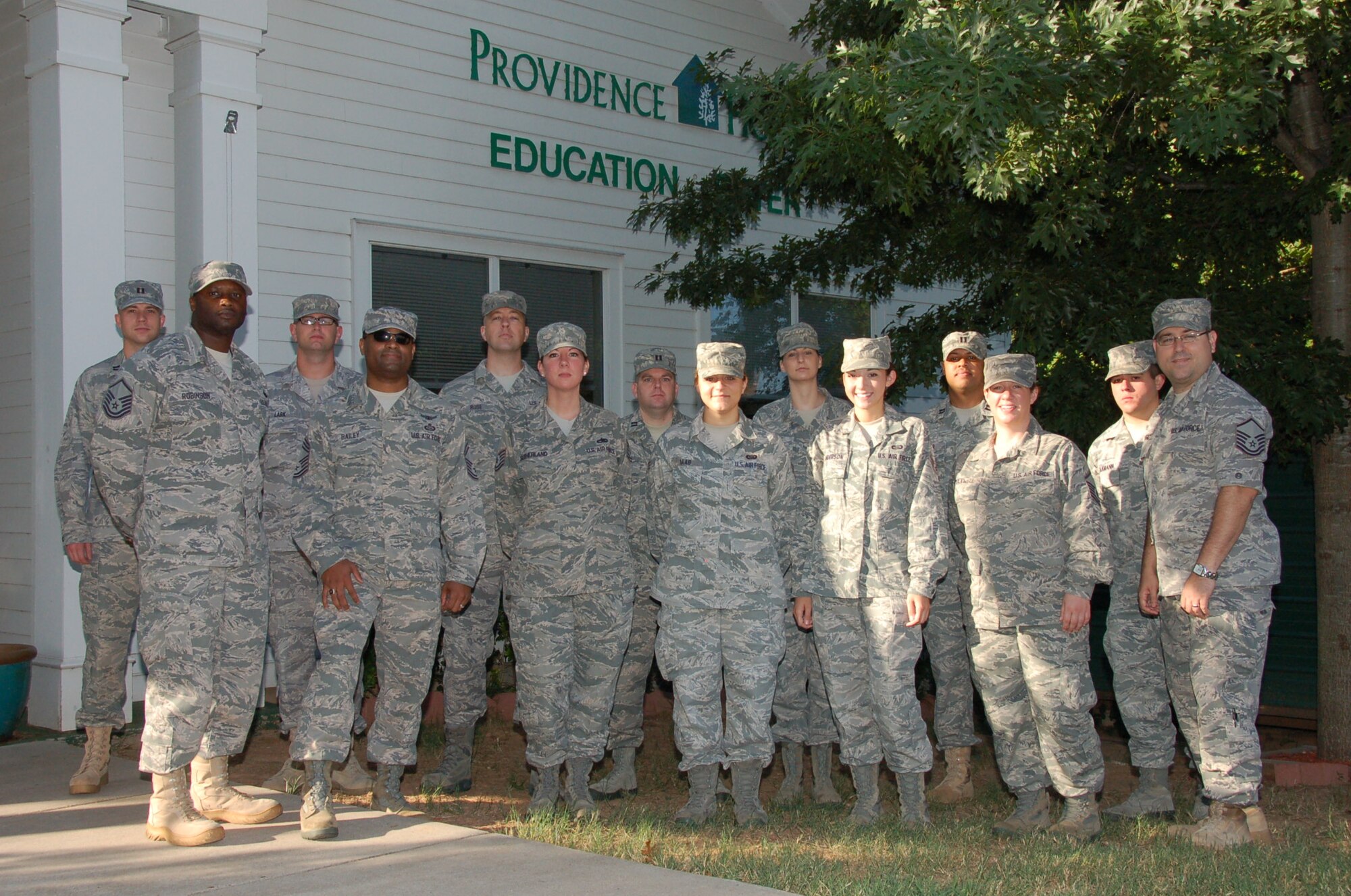 SHREVEPORT, La. – Fourteen members of the Eighth Air Force volunteered their time to help the Providence House in downtown Shreveport, La., July 20. The members were from the Headquarters Eighth Air Force staff and 608th Air Operations Center. The Airmen built new shelves for the daycare and moved furniture in the warehouse. The Providence House is a residential development center for homeless families with children, providing comprehensive support services for improving the family structure and moving the family into independent living. (U.S. Air Force photo by Staff Sgt. Brian Stives)