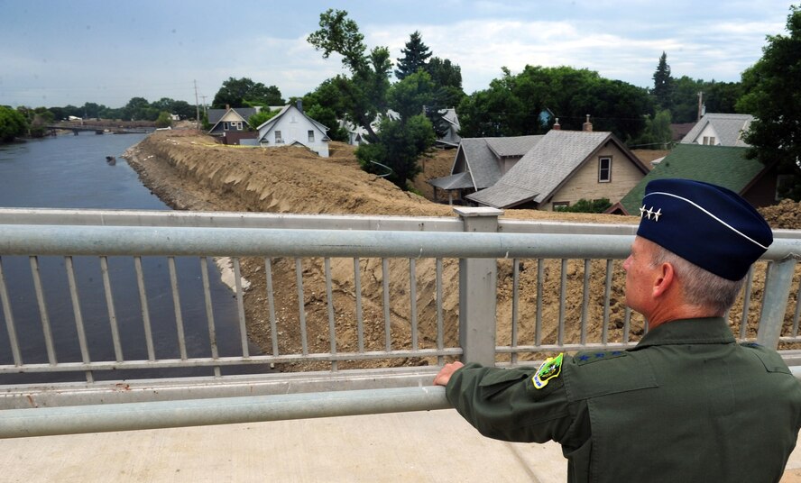 MINOT AIR FORCE BASE, N.D. -- Lt. Gen. Jim Kowalski, Air Force Global Strike Command commander, looks out at the elevated waters July 8 after the flood of the Souris River here. General Kowalski received briefings from senior leaders, visited affected areas, talked with displaced families and met with Airmen working on flood issues. (U.S. Air Force photo/Senior Airman Michael J. Veloz)
