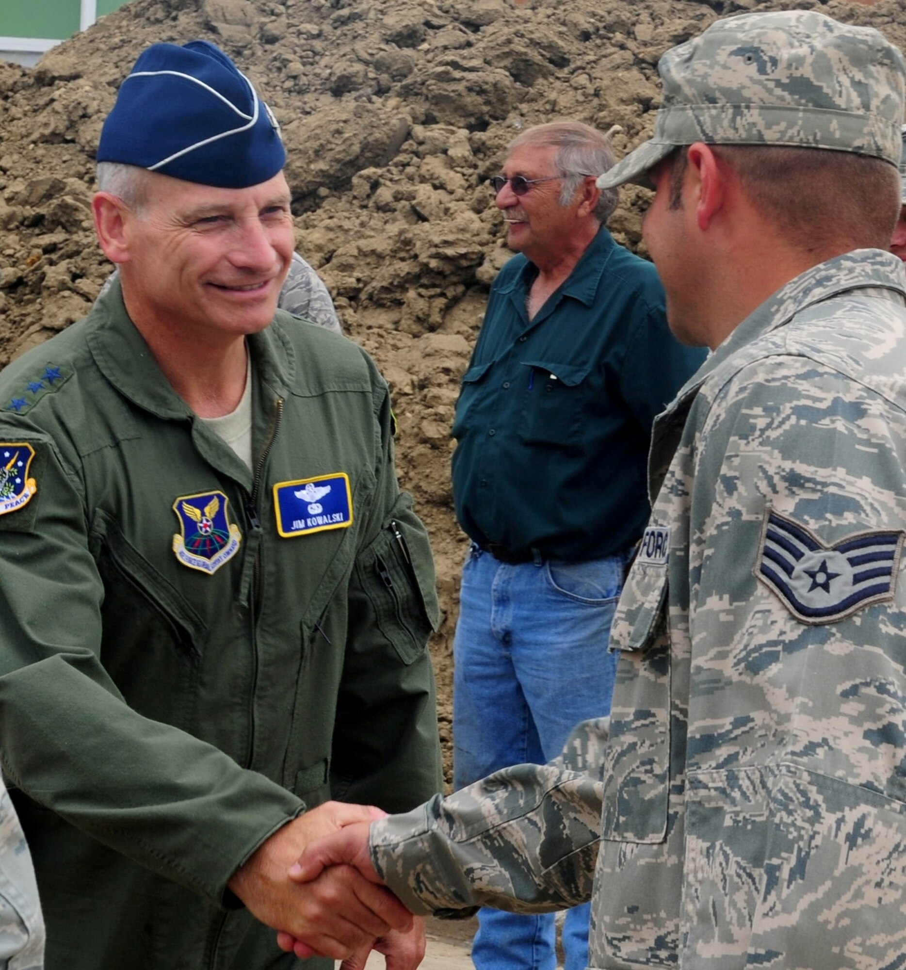 MINOT AIR FORCE BASE, N.D. -- Lt. Gen. Jim Kowalski, Air Force Global Strike Command commander, meets with Airmen from the 5th Civil Engineer Squadron here July 8. General Kowalski visited Team Minot to learn about the recent flood and how it has affected Airmen. (U.S. Air Force photo/Senior Airman Michael J. Veloz)