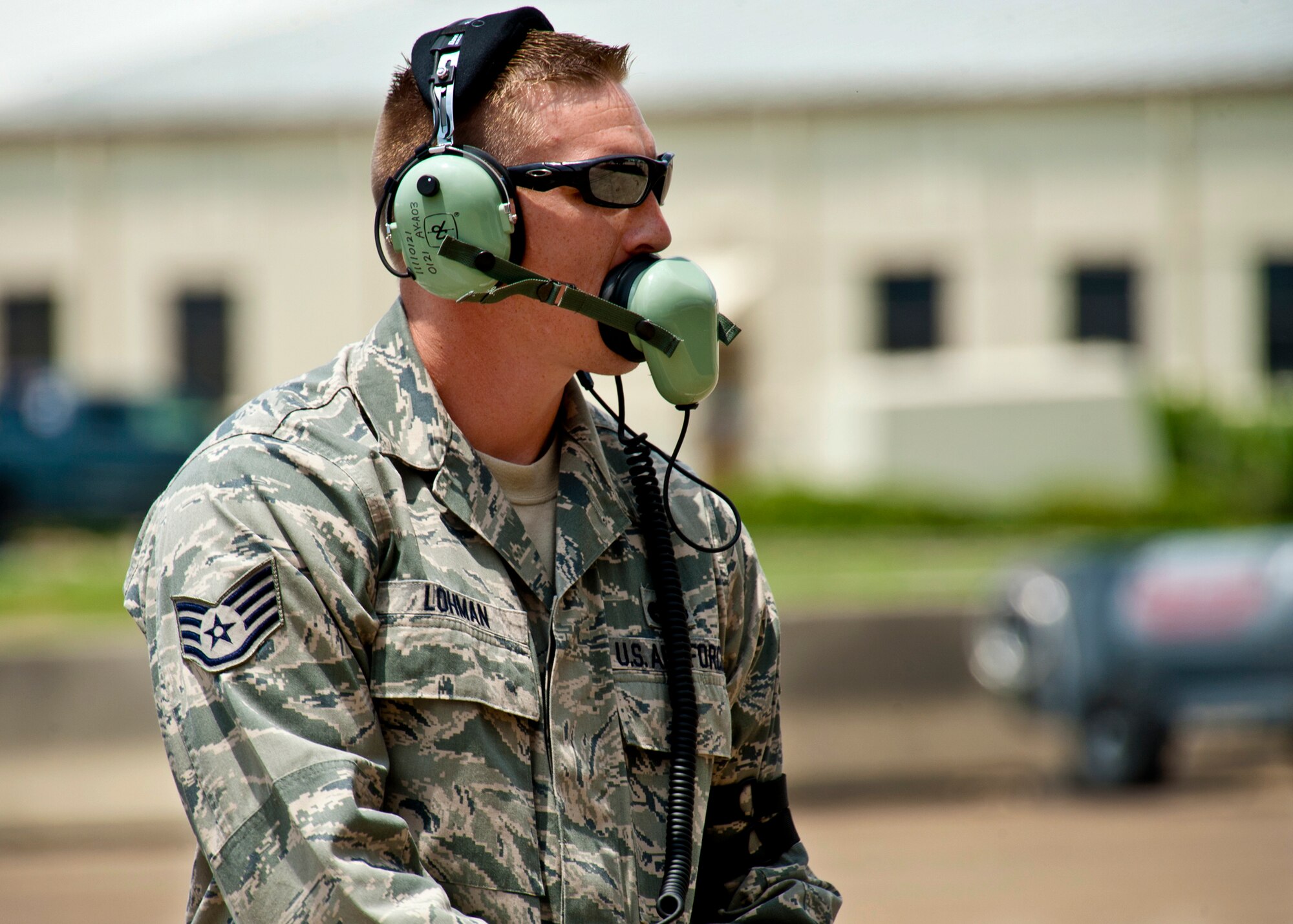 Staff Sgt. Matthew Lohman, of the 33rd Aircraft Maintenance Squadron, communicates with the F-35 Lightning II joint strike fighter during shutdown procedures at Eglin Air Force Base, Fla., July 20.  The pilot, Maj. Joseph Bachmann, of the 33rd Operations Group, is the first Marine pilot to be JSF certified and the aircraft is the second JSF to arrive to the 33rd Fighter Wing.  (U.S. Air Force photo/Samuel King Jr.)