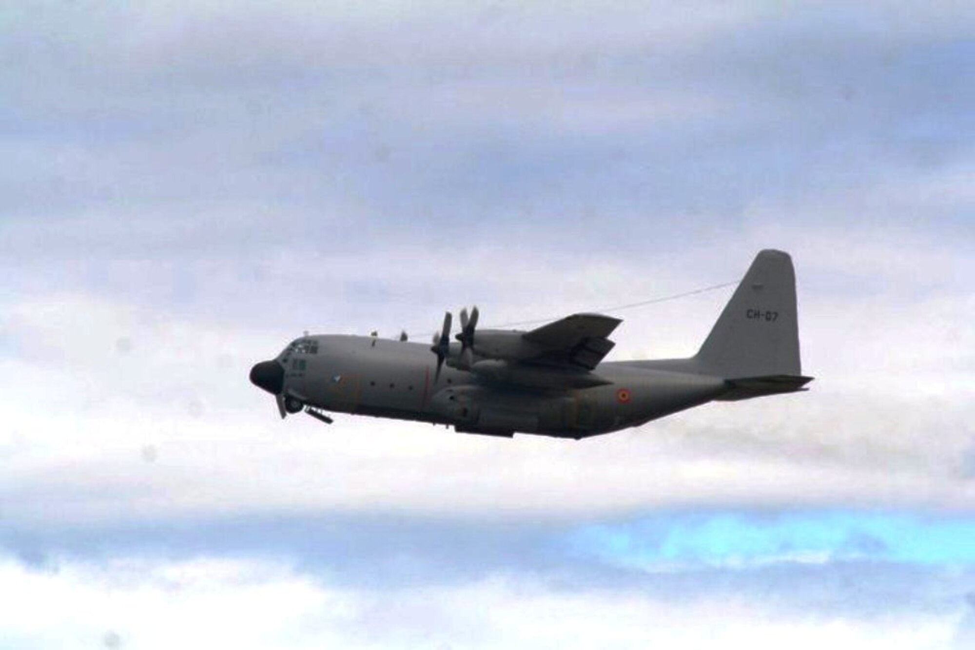 A Belgium air force C-130 takes off from McChord Field, Joint Base Lewis-McChord, Wash., on July 20, 2011, as part of preparations for Air Mobility Rodeo 2011. Rodeo, sponsored by the Air Mobility Command, is the Mobility Air Force's (MAF) readiness competition. This competition focuses on improving worldwide air mobility forces' professional core abilities. More than 150 teams and 3,000 people from the Air Force, and Air Force Reserve, as well as allied nations, participated in the 2011 competition. (U.S. Air Force Photo/Master Sgt. Scott T. Sturkol) 

