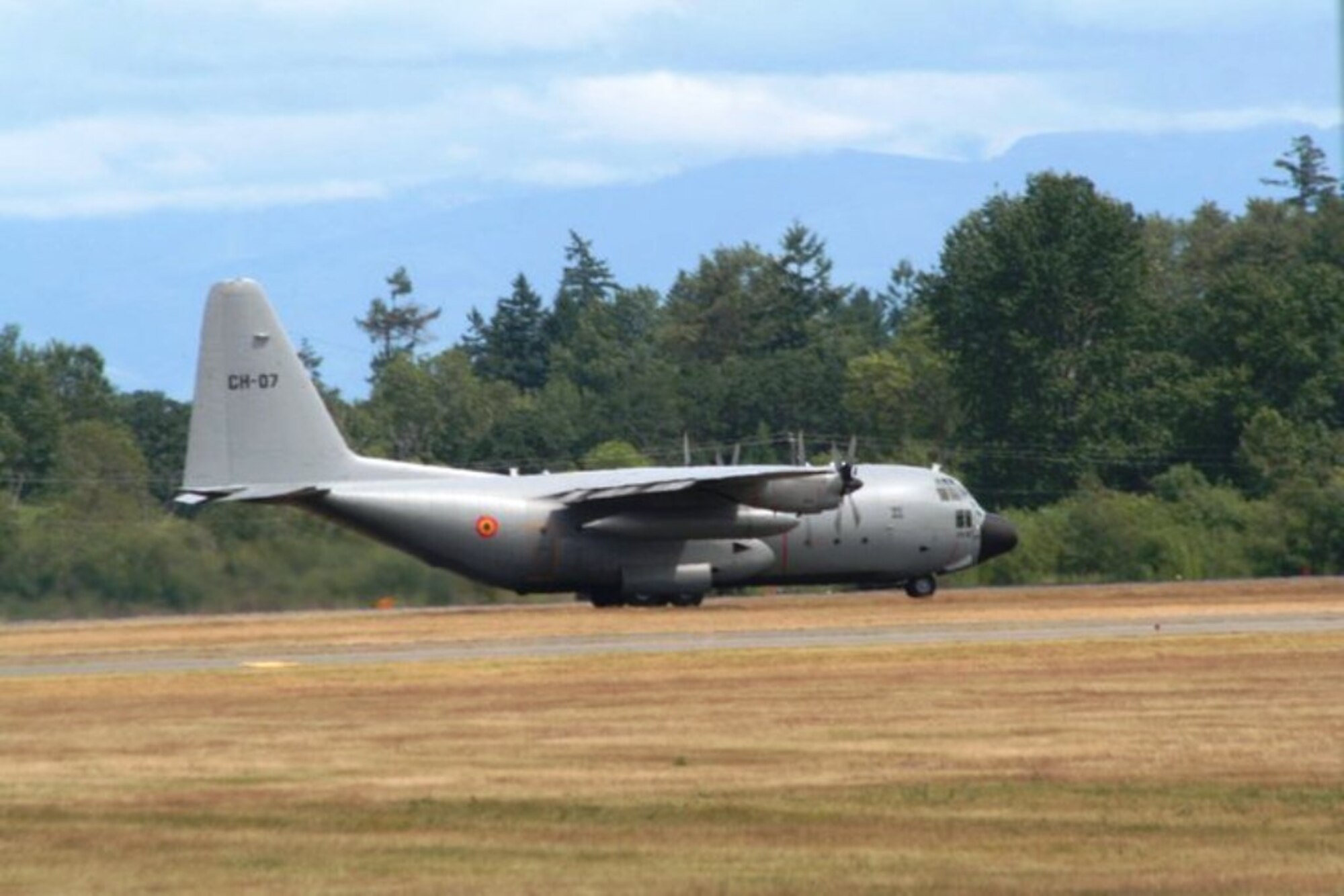 A Belgium air force C-130 taxies for take-off at McChord Field, Joint Base Lewis-McChord, Wash., on July 20, 2011, as part of preparations for Air Mobility Rodeo 2011. Rodeo, sponsored by the Air Mobility Command, is the Mobility Air Force's (MAF) readiness competition. This competition focuses on improving worldwide air mobility forces' professional core abilities. More than 150 teams and 3,000 people from the Air Force, and Air Force Reserve, as well as allied nations, participated in the 2011 competition. (U.S. Air Force Photo/Master Sgt. Scott T. Sturkol) 

