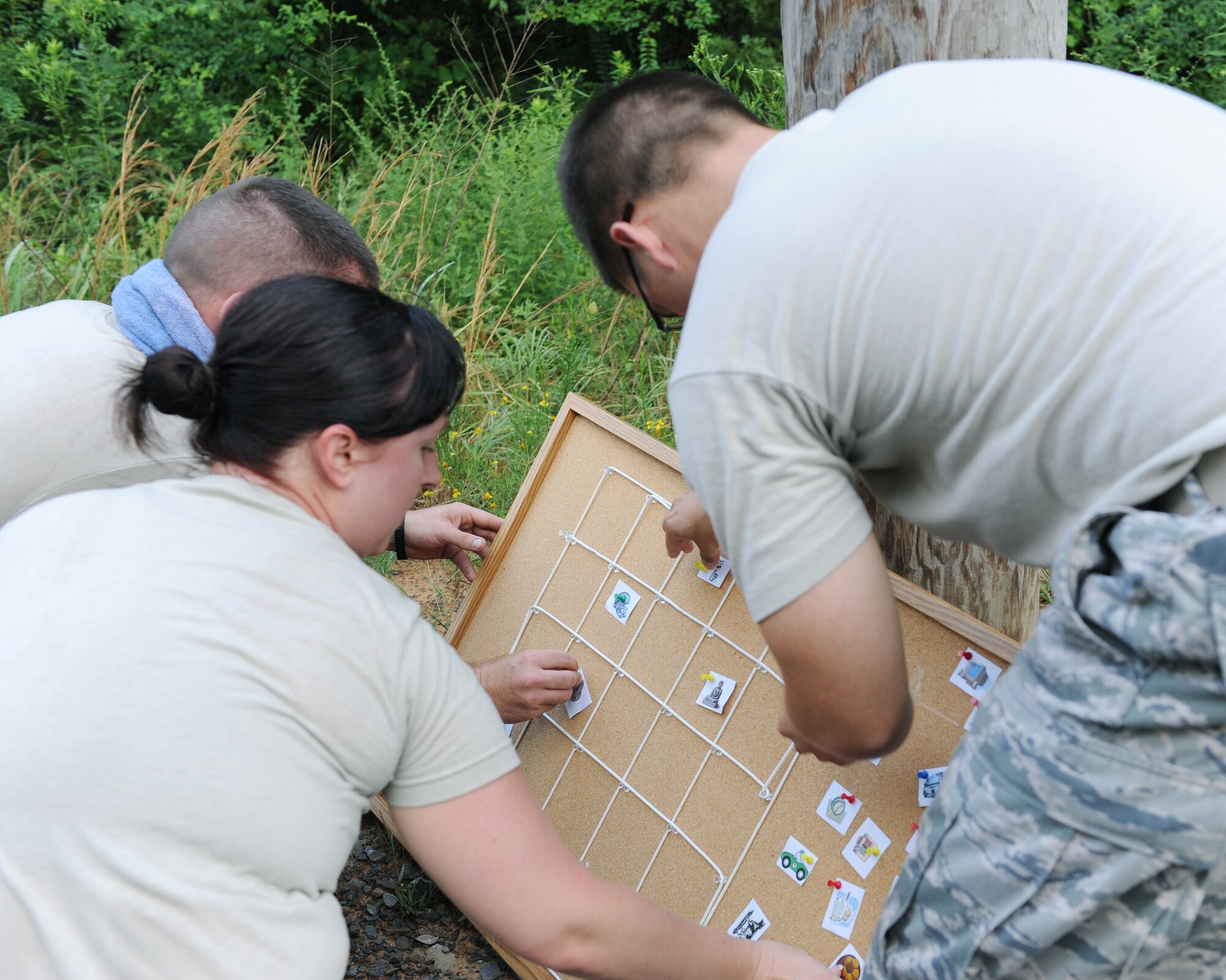 The 19th Comptroller Squadron Air Mobility Command RODEO team re-arranges a scrambled memory board recall while being timed July 15, 2011, at Little Rock Air Force Base, Ark. The members practice 10 different courses to get ready for the upcoming AMC RODEO July 24-29, 2011, at Joint Base Lewis-McChord Air Force Base, Wash. (U.S. Air Force photo by Airman 1st Class Ellora Remington)