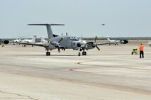LAUGHLIN AIR FORCE BASE, Texas – An Army RC-12 aircraft prepares for takeoff after a quick stop at Laughlin. The aircraft is originally from Fort Huachuca, Ariz., and stopped at Laughlin to drop off a crew member to utilize an altitude chamber for annual training. (U.S. Air Force photo by Senior Airman Scott Saldukas)