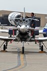 LAUGHLIN AIR FORCE BASE, Texas – Ralph Mersham Jr., T-6A Texan II aircraft maintainer, conducts inspections on a T-6A aircraft here July 20. The aircraft is a single-engine, two-seat primary training aircraft designed to train student pilots. (U.S. Air Force photo by Senior Airman Scott Saldukas)