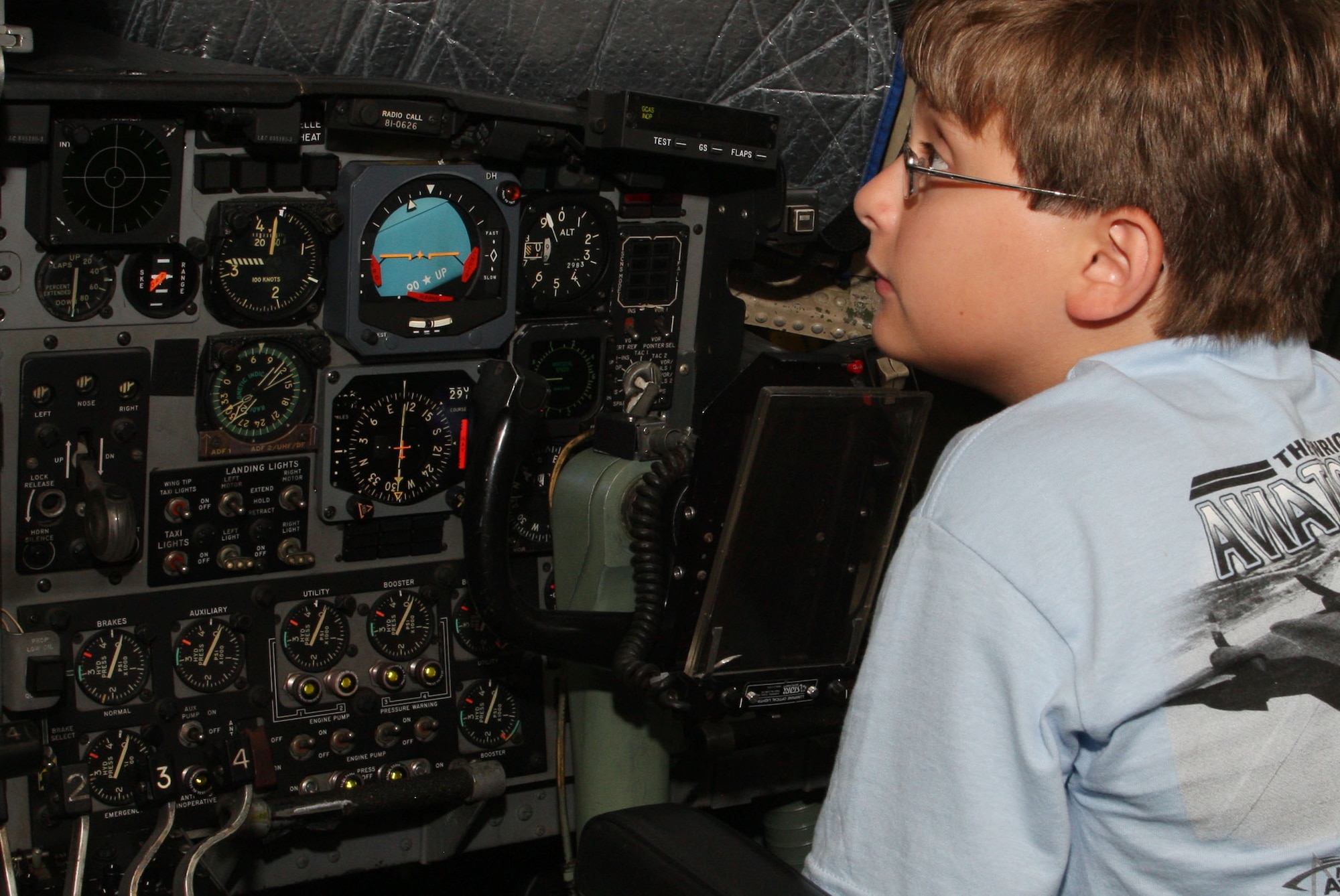 Checking out the instrument panel during the C-130 tour.  (U.S. Air Force Photo/Don Peek)