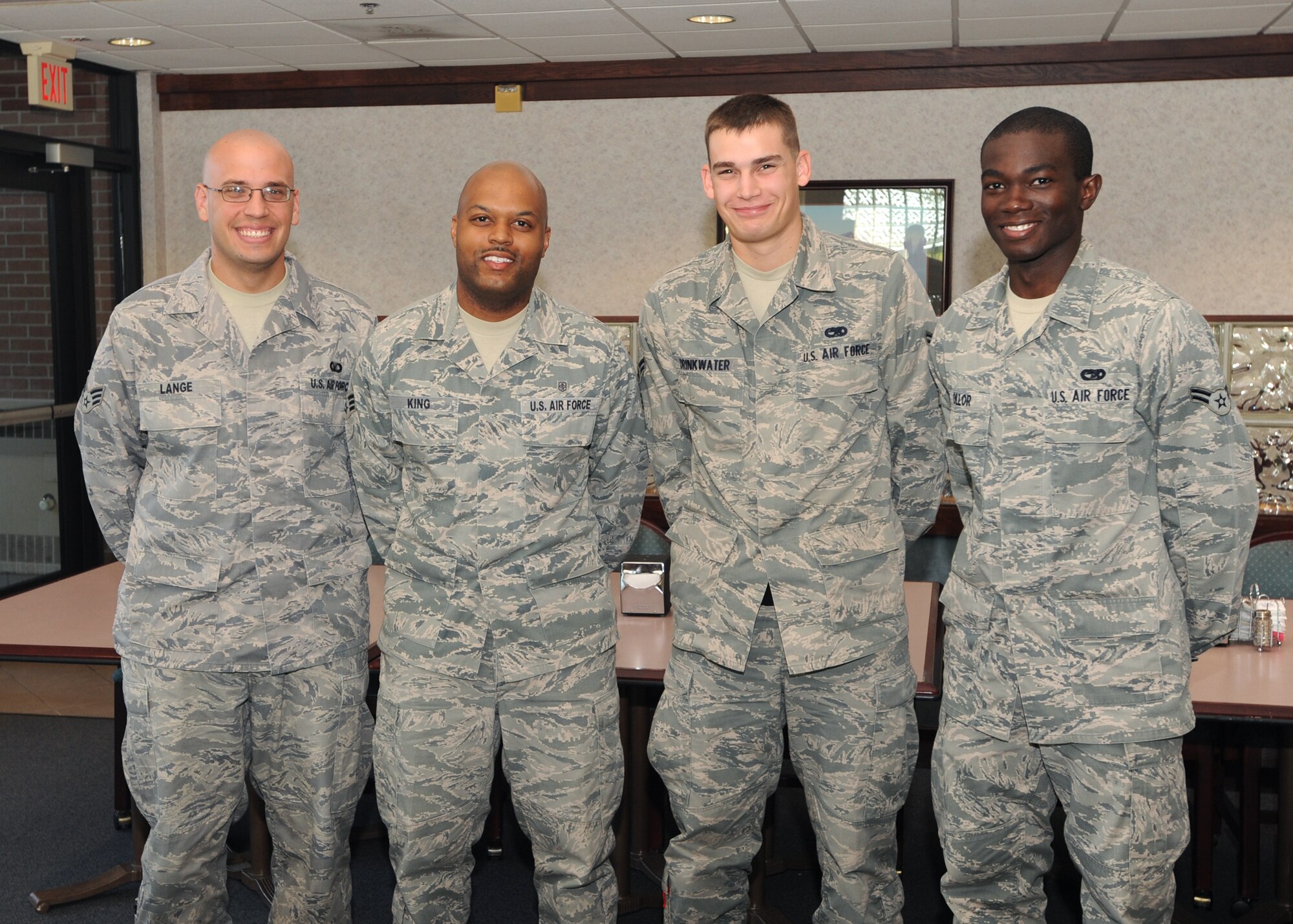 June’s Diamond Sharp Award recipients are (from left to right) Senior Airman Curtis Lange, 319th Operations Support Squadron; Senior Airman Brison King, 319th Medical Operations Squadron; Airman 1st Class Brandon Drinkwater, Det. 1; and Airman 1st Class Obarijima Ollor, 319th Logistics Readiness Squadron. (U.S. Air Force photo by Staff Sgt. Suellyn Nuckolls)