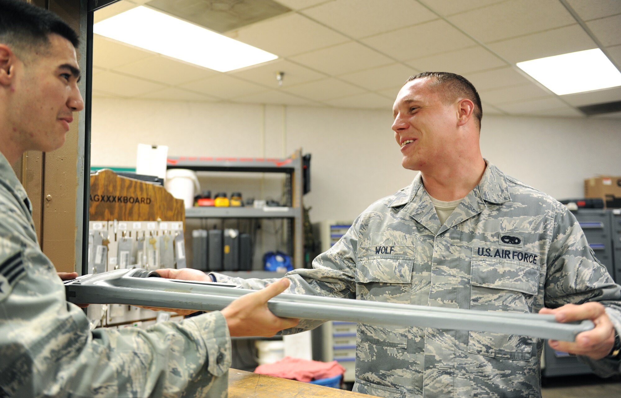 Senior Airman Joshua Wolf, a 19th Equipment Maintenance Squadron aerospace ground equipment production support section tool room custodian, receives a tool to be accounted for July 18, 2011, at Little Rock Air Force Base, Ark. The Jacksonville, Ark., native’s impeccable work ethic contributed to the flight’s 100 percent scheduling effectiveness, and an impressive 91 percent equipment in-commission rate exceeding the Air Mobility Command standard by six percent. (U.S. Air Force photo by Airman 1st Class Ellora Remington)