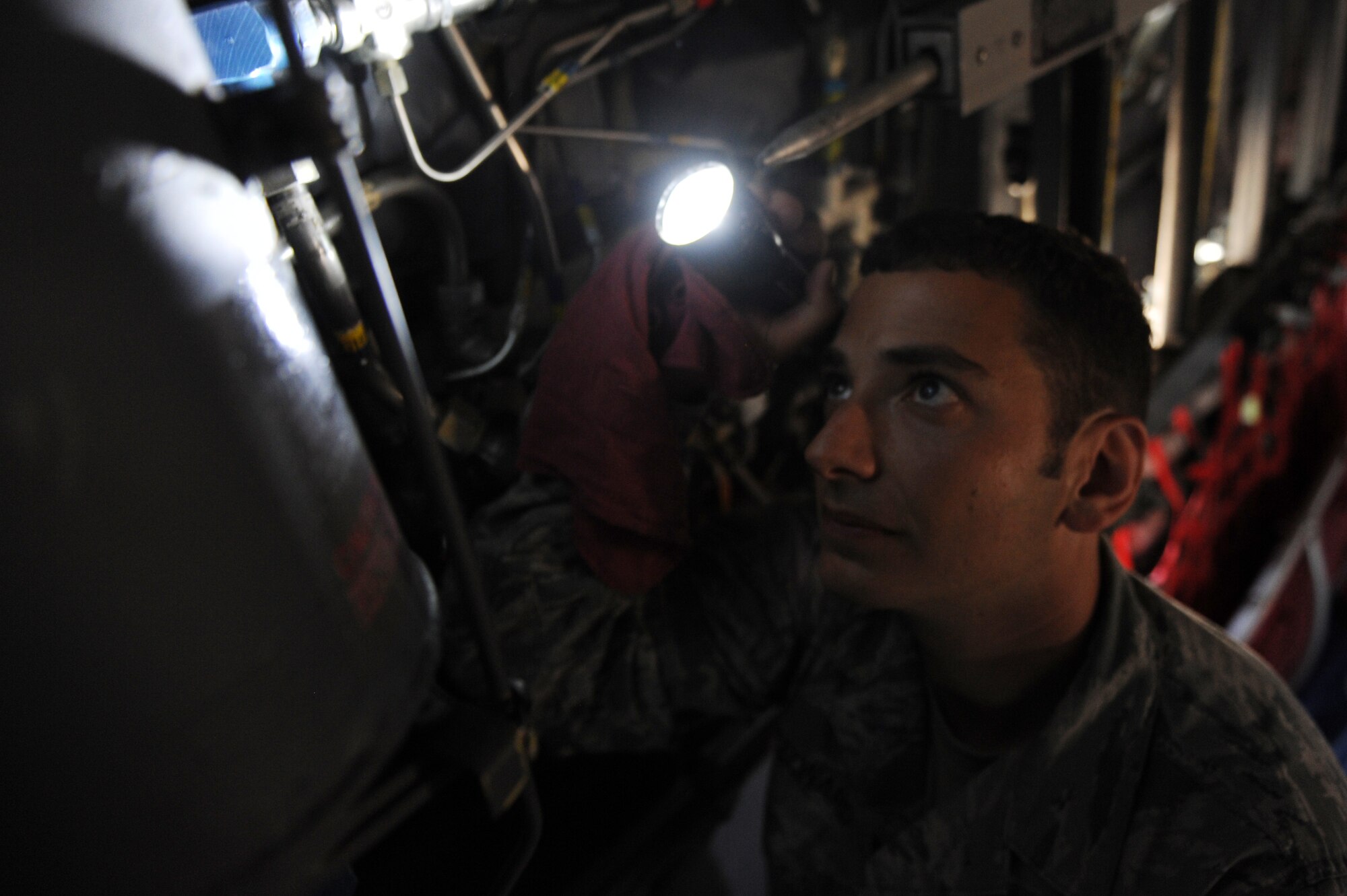 Staff Sgt.  Jordan Leonard, a 314th Aircraft Maintenance Squadron hydraulics craftsman checks the servicing utility reservoir of a C-13o in preparation for the Air Mobility Command Rodeo July 18, 2011, at Little Rock Air Force Base, Ark.  For this year’s competition More than 150 teams and 3,000 people from the Air Force, and Air Force Reserve, as well as allied nations, are expected to participate. (U.S. Air Force photo/Airman 1st Class Rusty Frank)