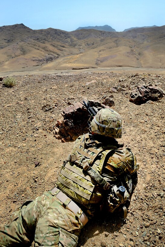 U.S. Army Staff Sgt. Todd Hobbs secures an area during a land survey in Arghandab, Afghanistan, July 20, 2011. Hobbs is a squad leader assigned to the Provincial Reconstruction Team Zabul's security force.